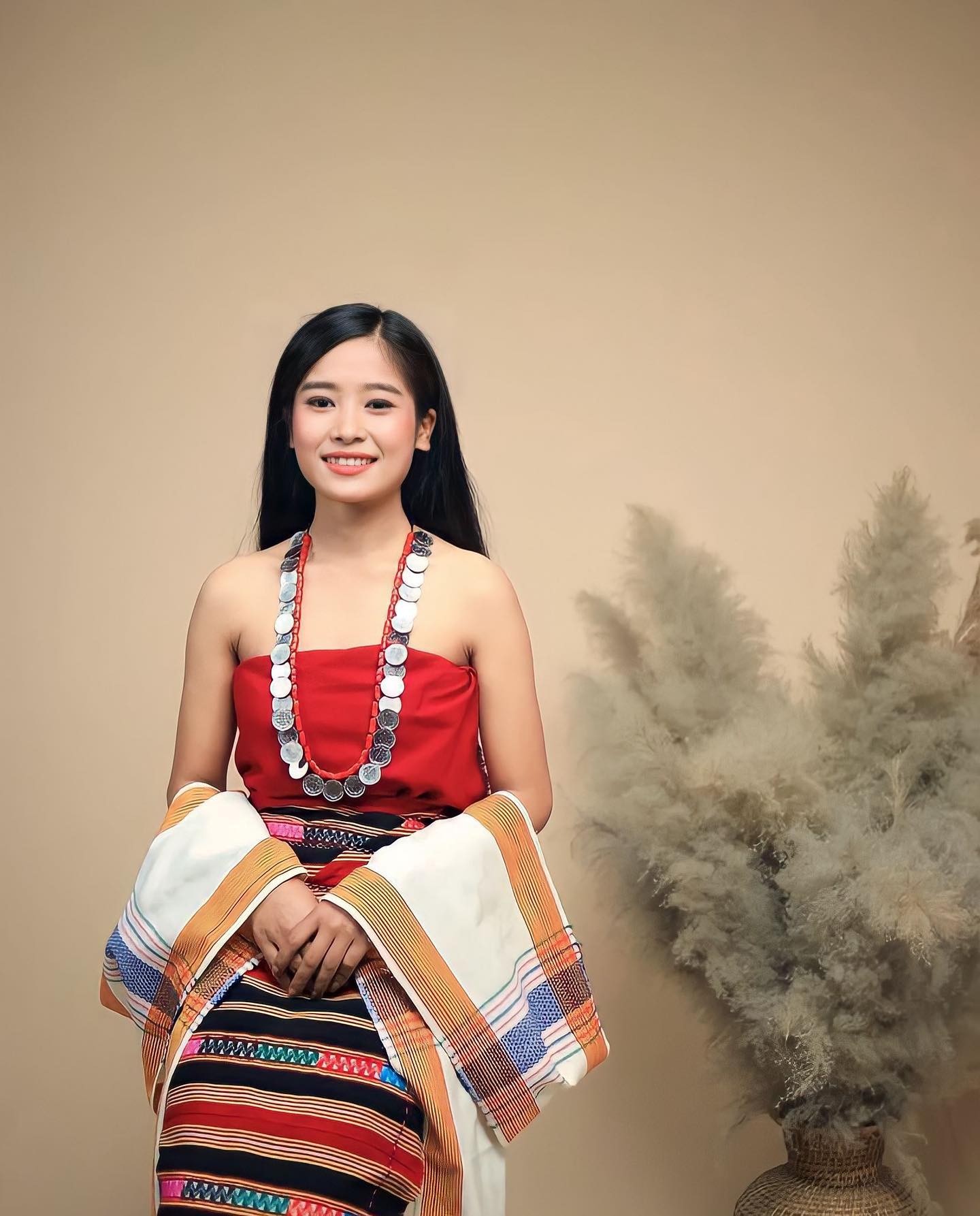 The Mizos - A beautiful lady in Pang Traditional Attire...