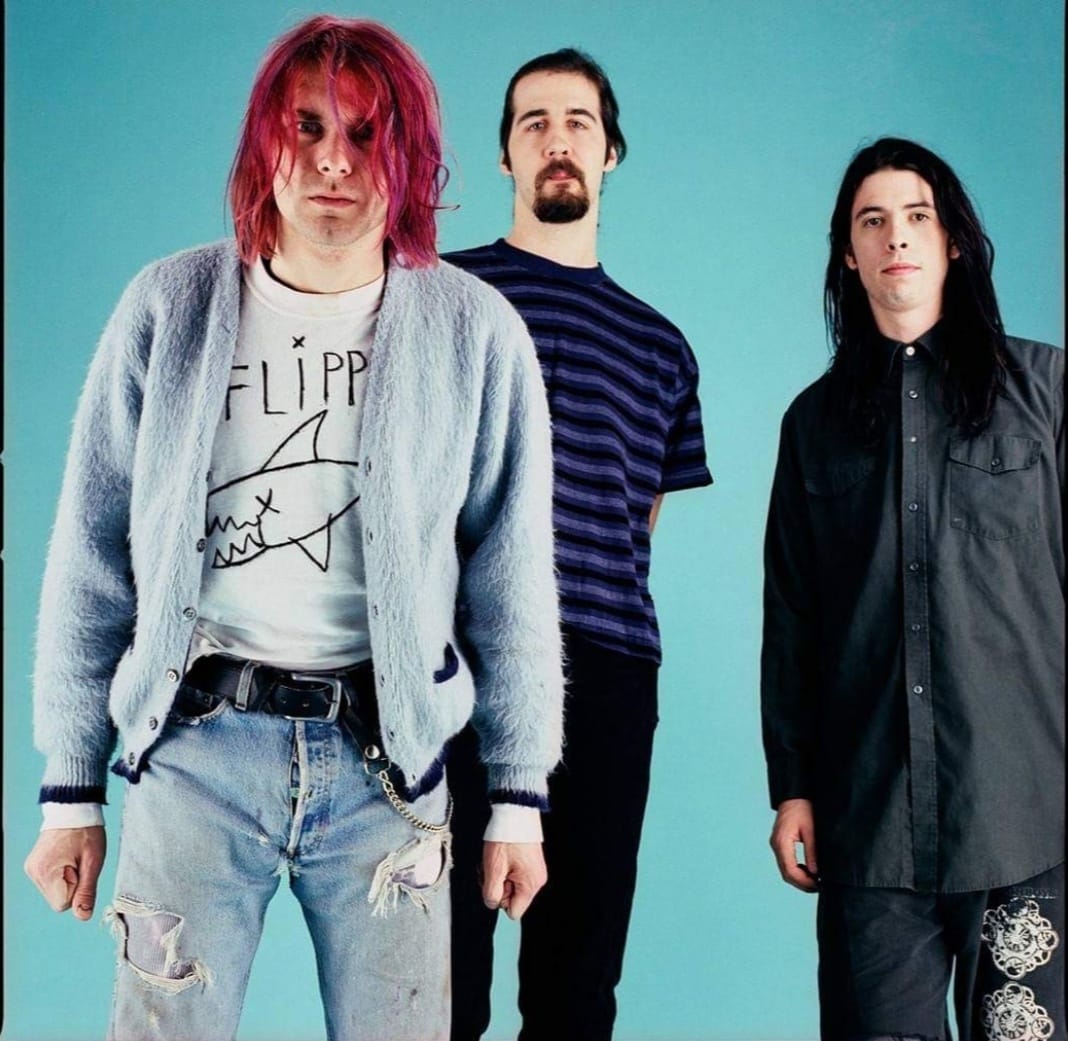 Nirvana wearing plastic masks, shot for Sub Pop in NYC on April 25