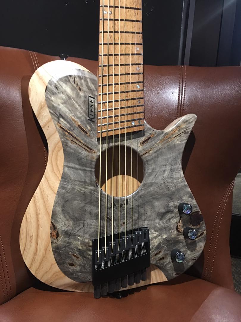 A gorgeous Zeus 6 string multiscale with a Birdseye Maple fretboard.