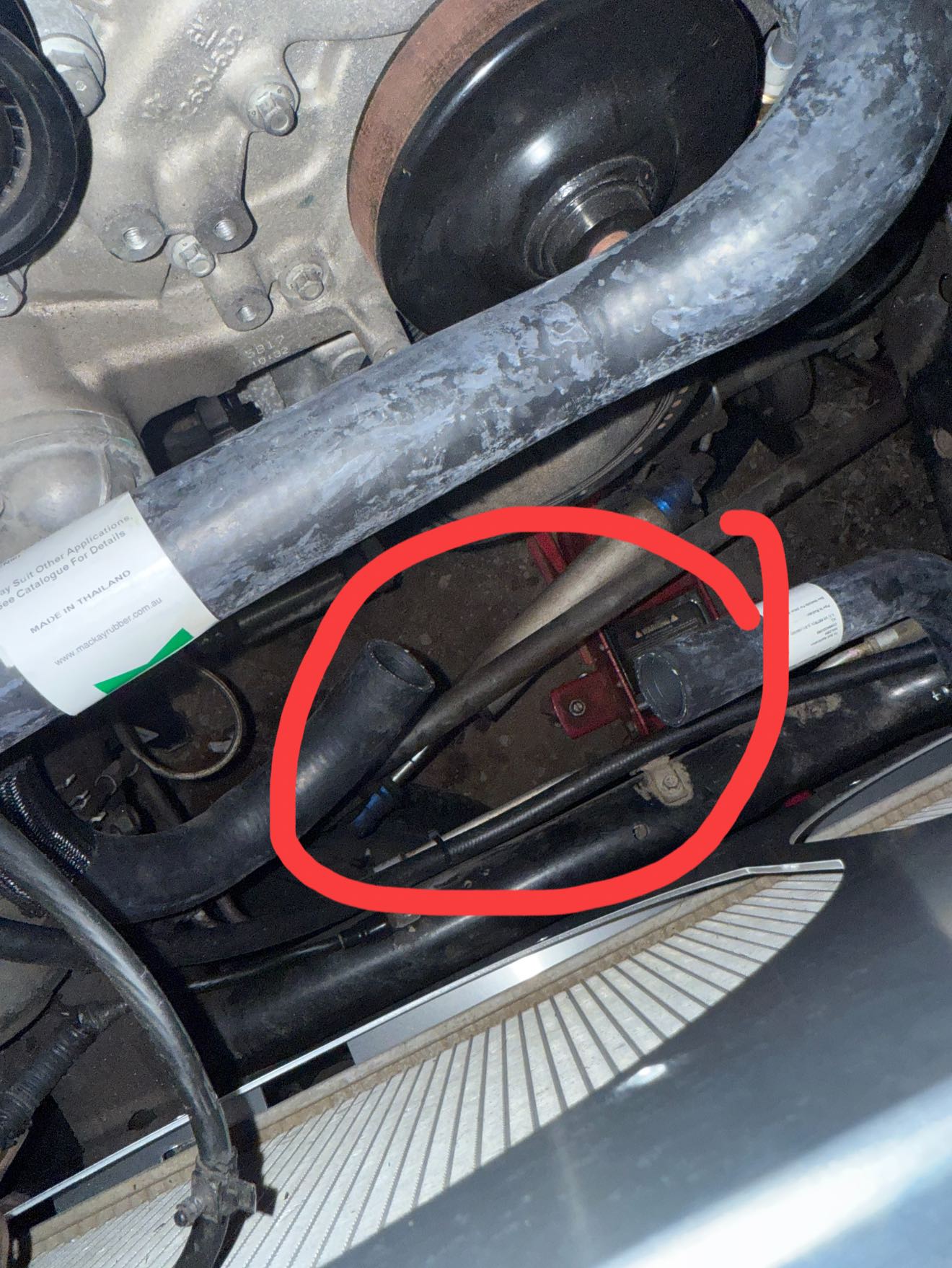 Bottom radiator hose that rubs on the a/c pulley. Anyone got a new