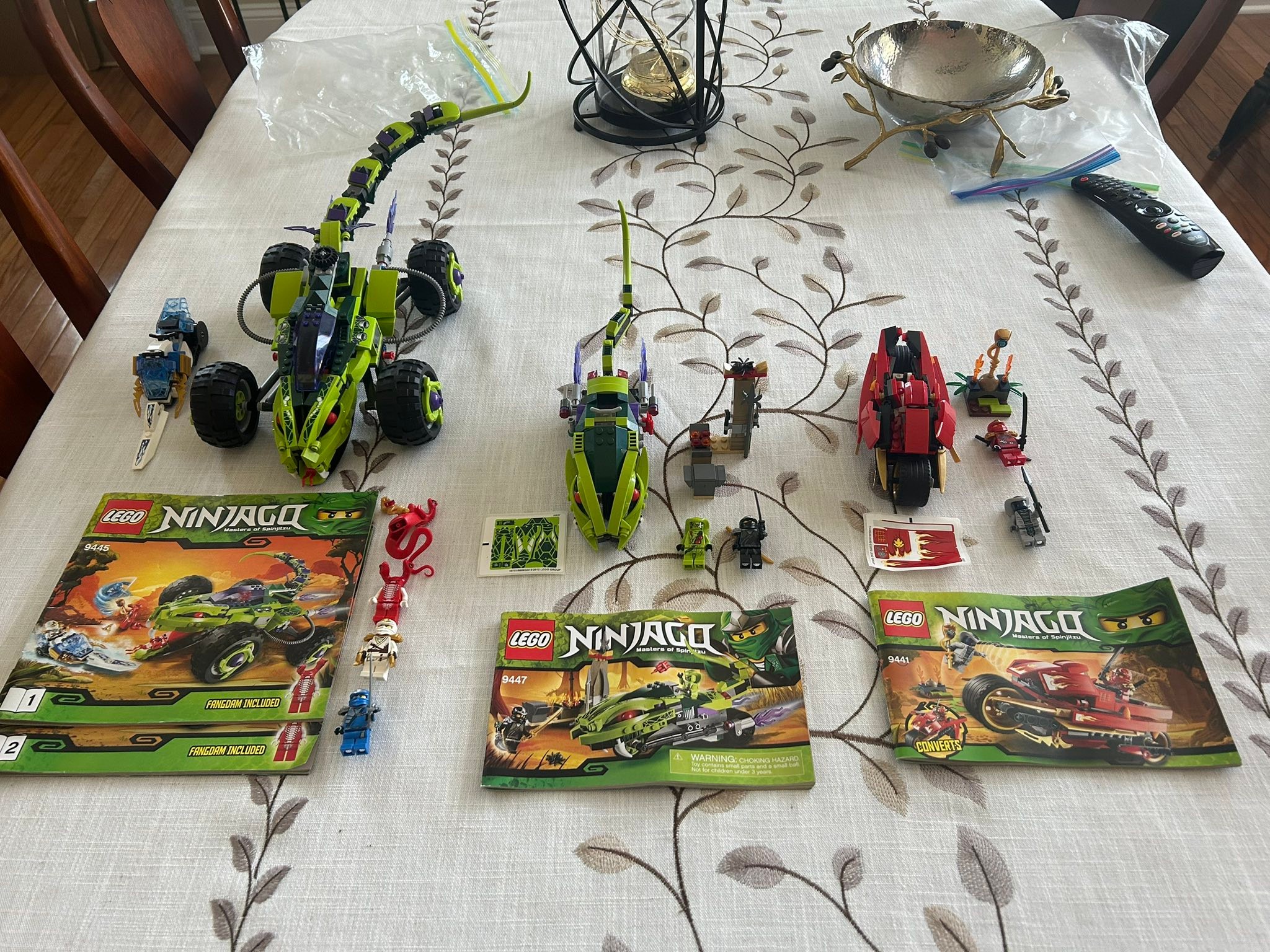 Three Lego Ninjago sets (9445, 9447, 9441) all complete with