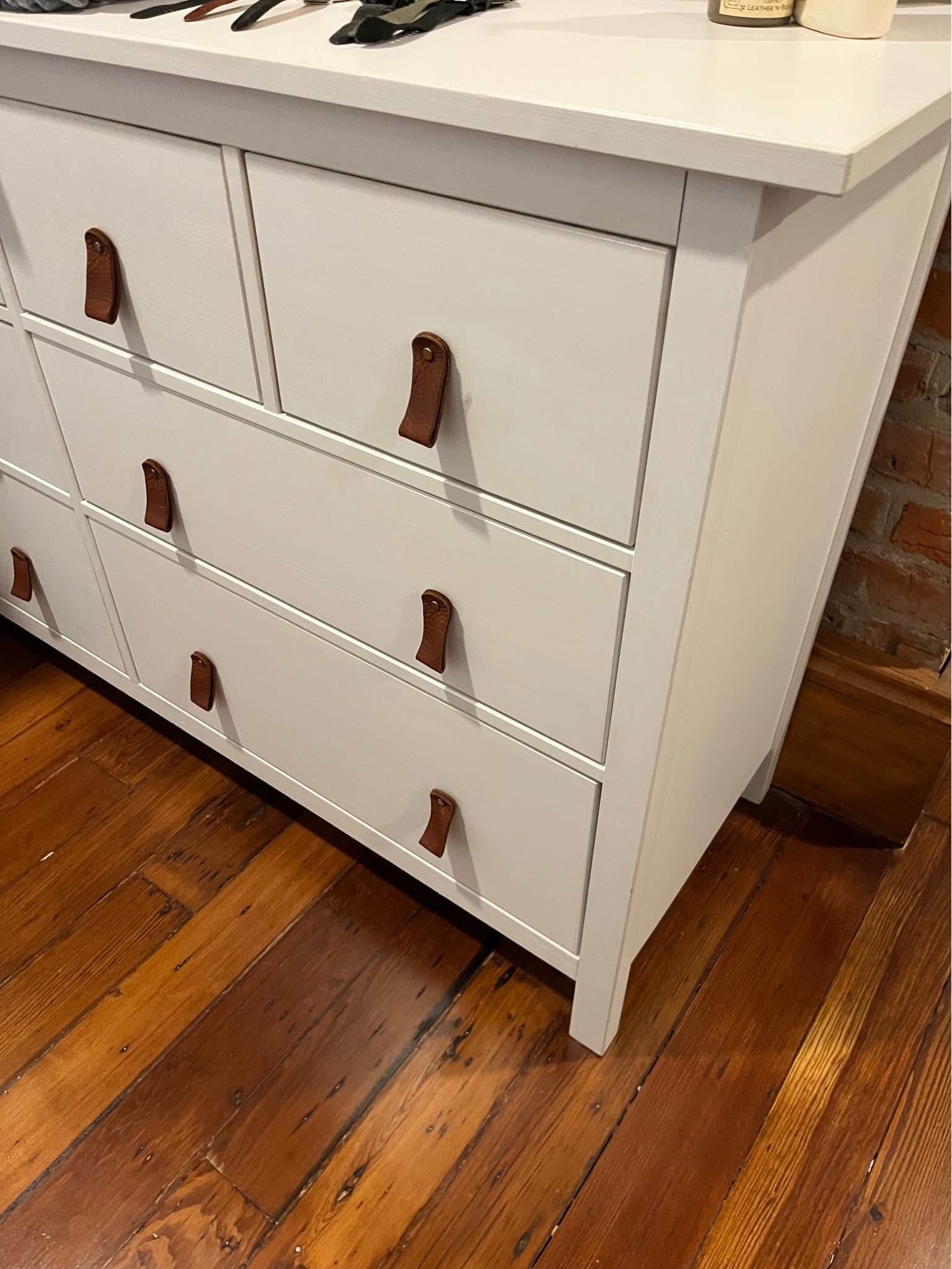 white dresser leather pulls ikea dresser, glides really well, has pulls. Great condition a few small scratches. It's a Matt white paint finish. 63 inches wide 19.5 deep and 37.5 tall atf-sm-03.25.26