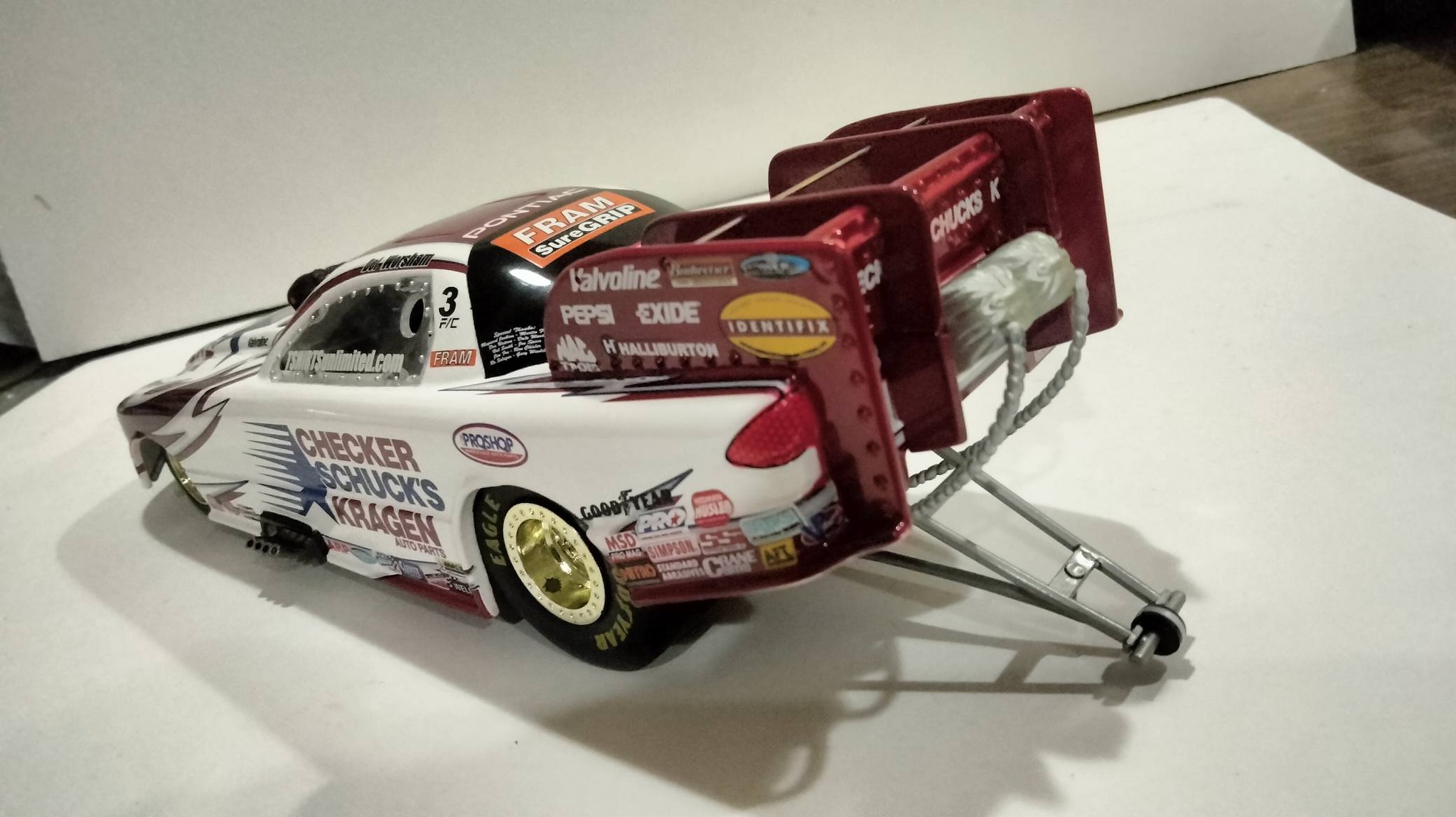 Racing Champions 1:24th scale Del Worsham Checker Shuck's Kragen