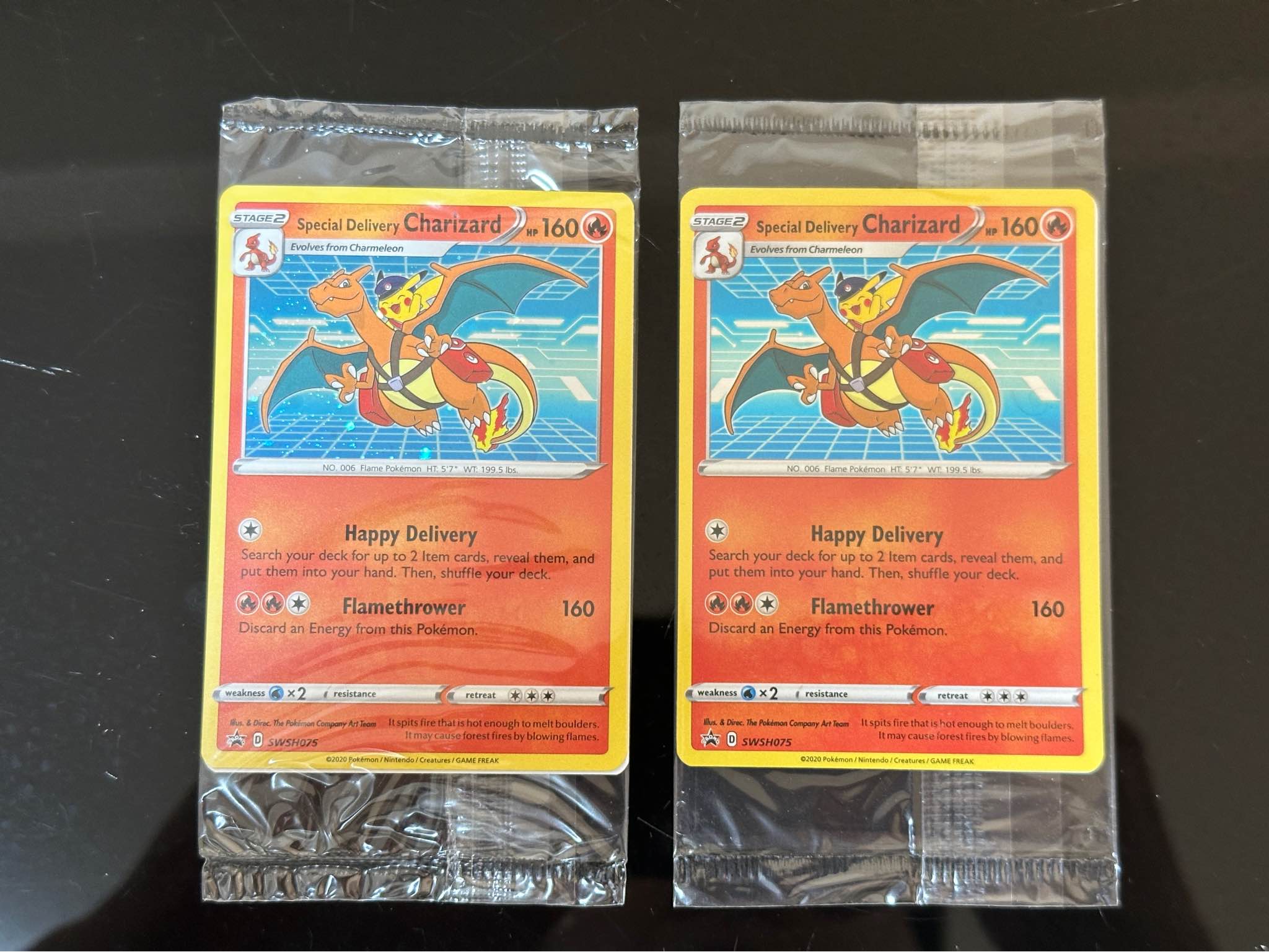 左邊5800 右邊有旋 6800 Special Delivery Charizard P [SWSH075