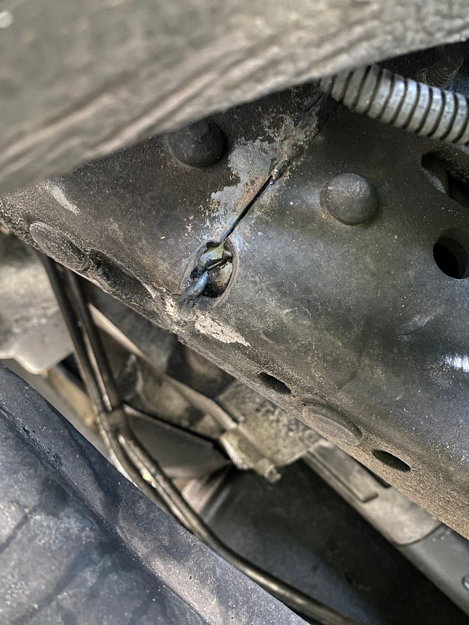 are cracks near front wheels factory issue?