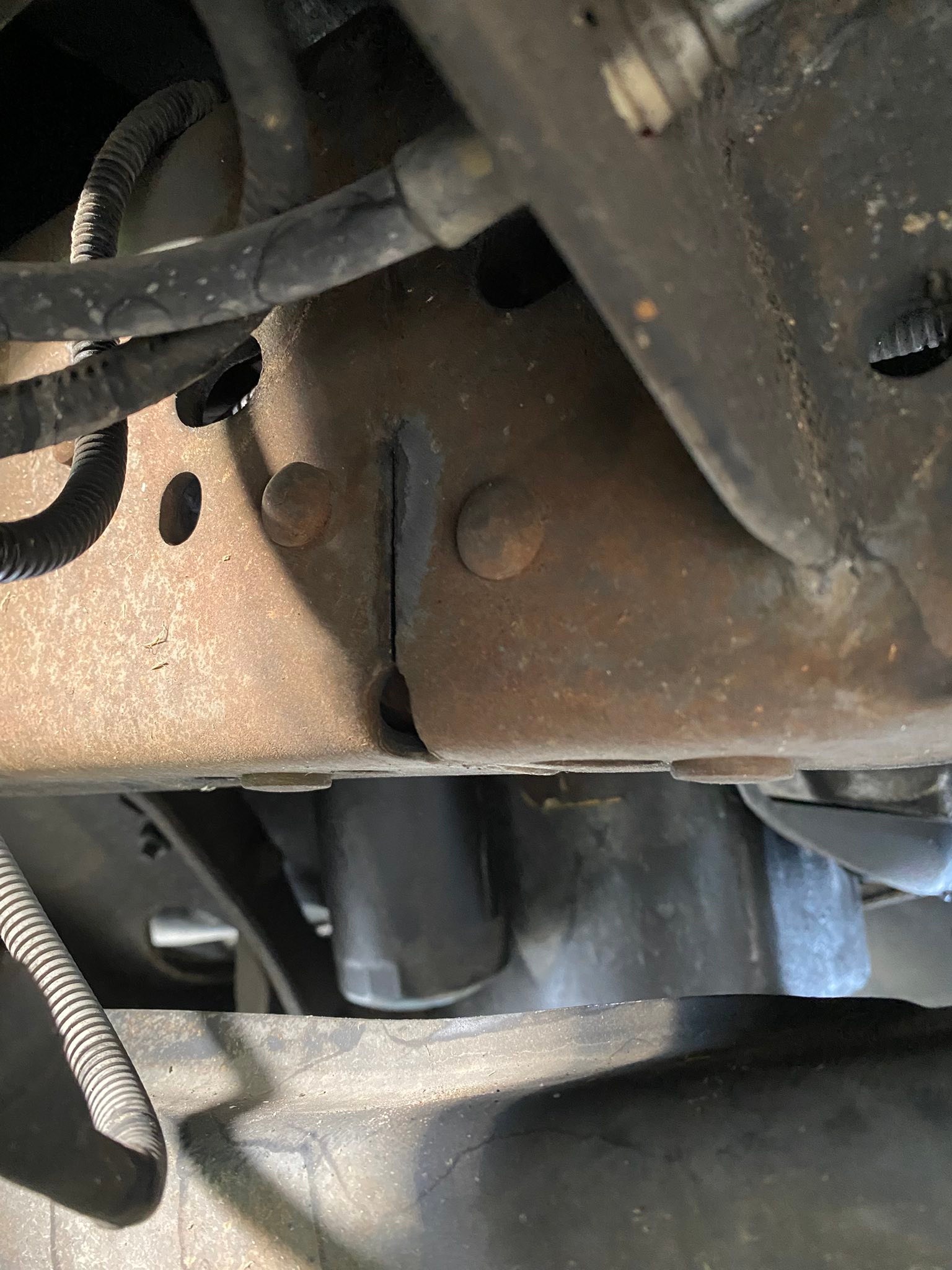 are cracks near front wheels factory issue?