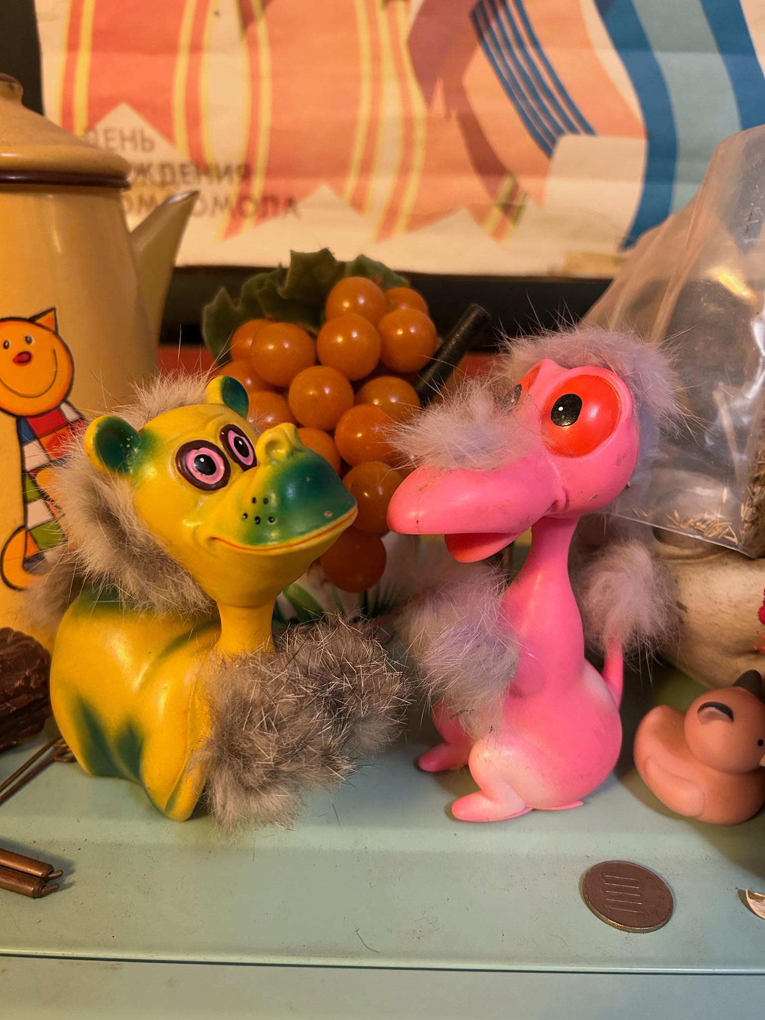 What is the pink bird figure from a vintage toy collection?