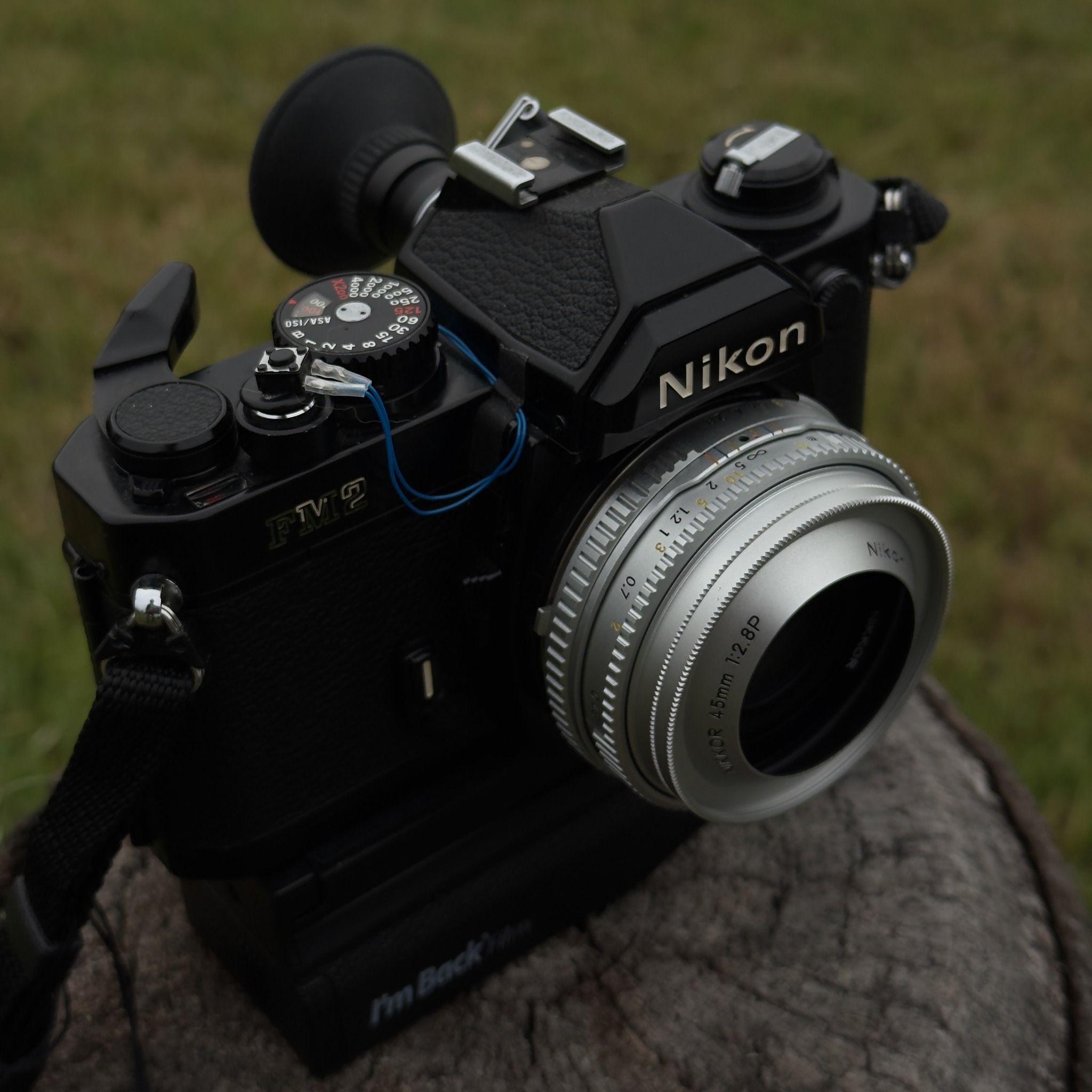 Nikon FM2/T*** with ***Nikkor 45mm f2.8 P***