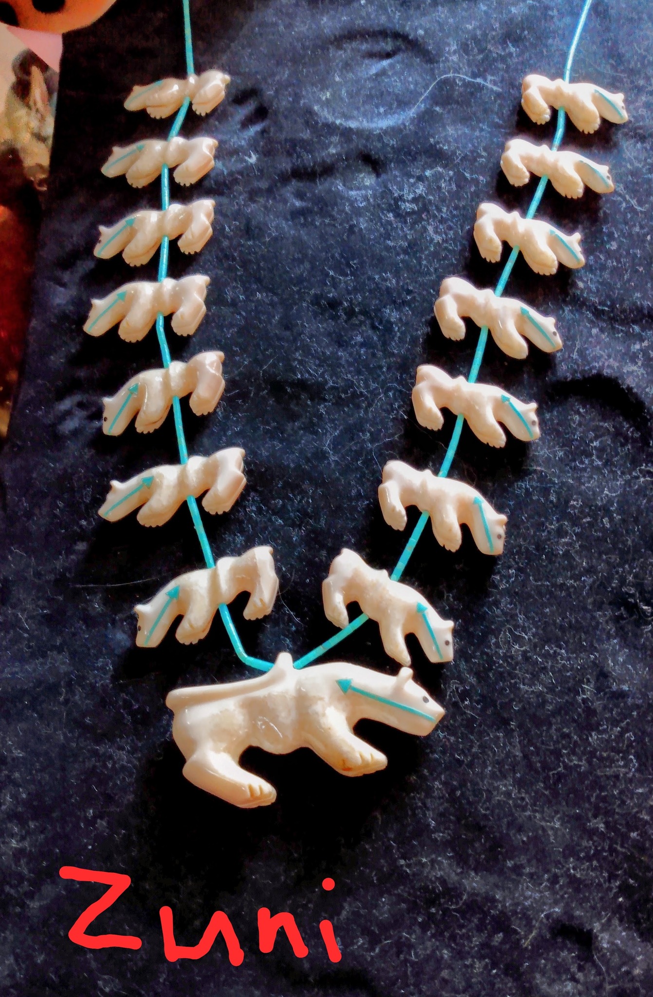 Andres Quandelacy's mountain lion fetish necklace with turquoise