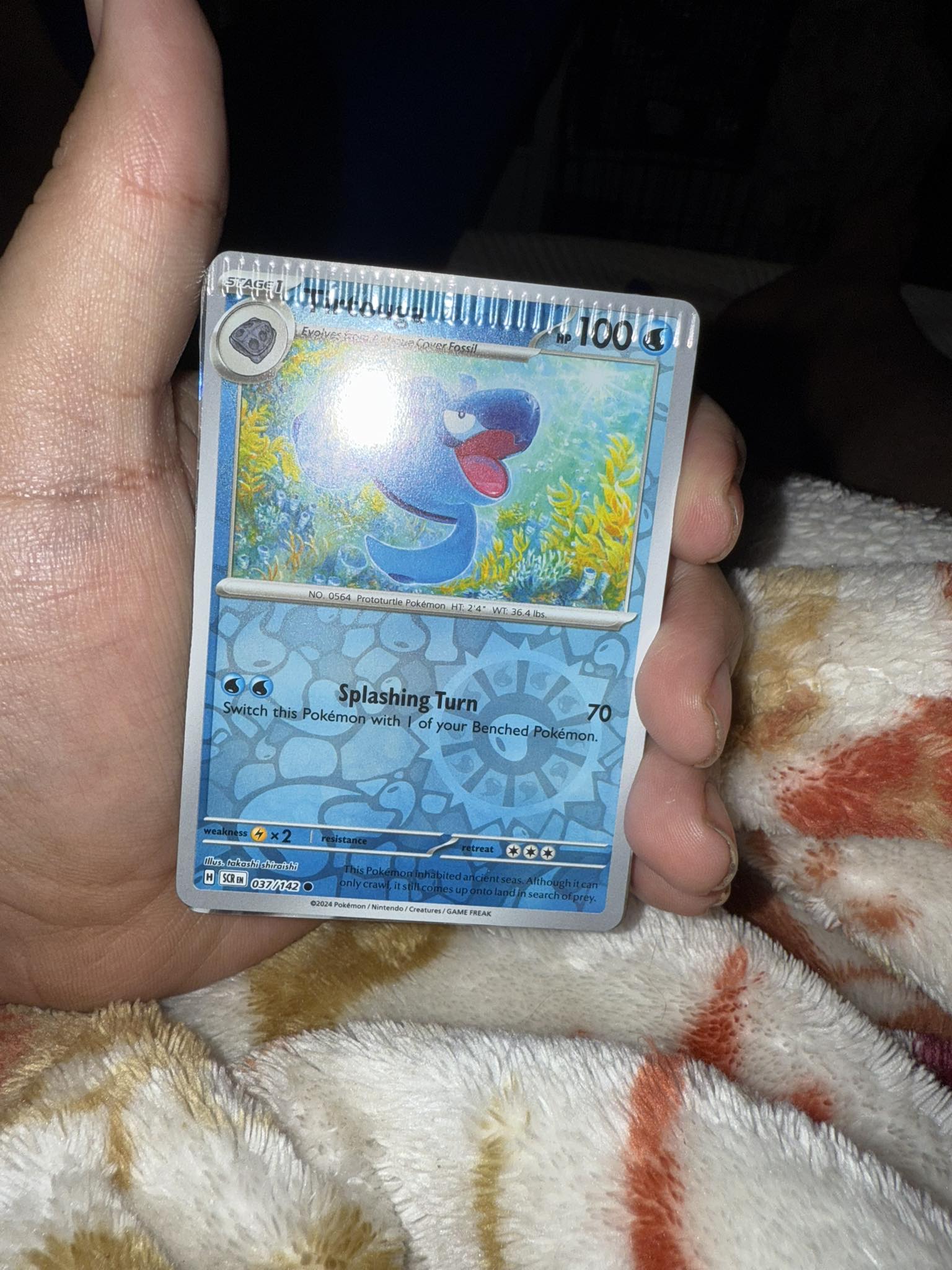 Why would a Pokemon card come back with a grade of 4 due to a 