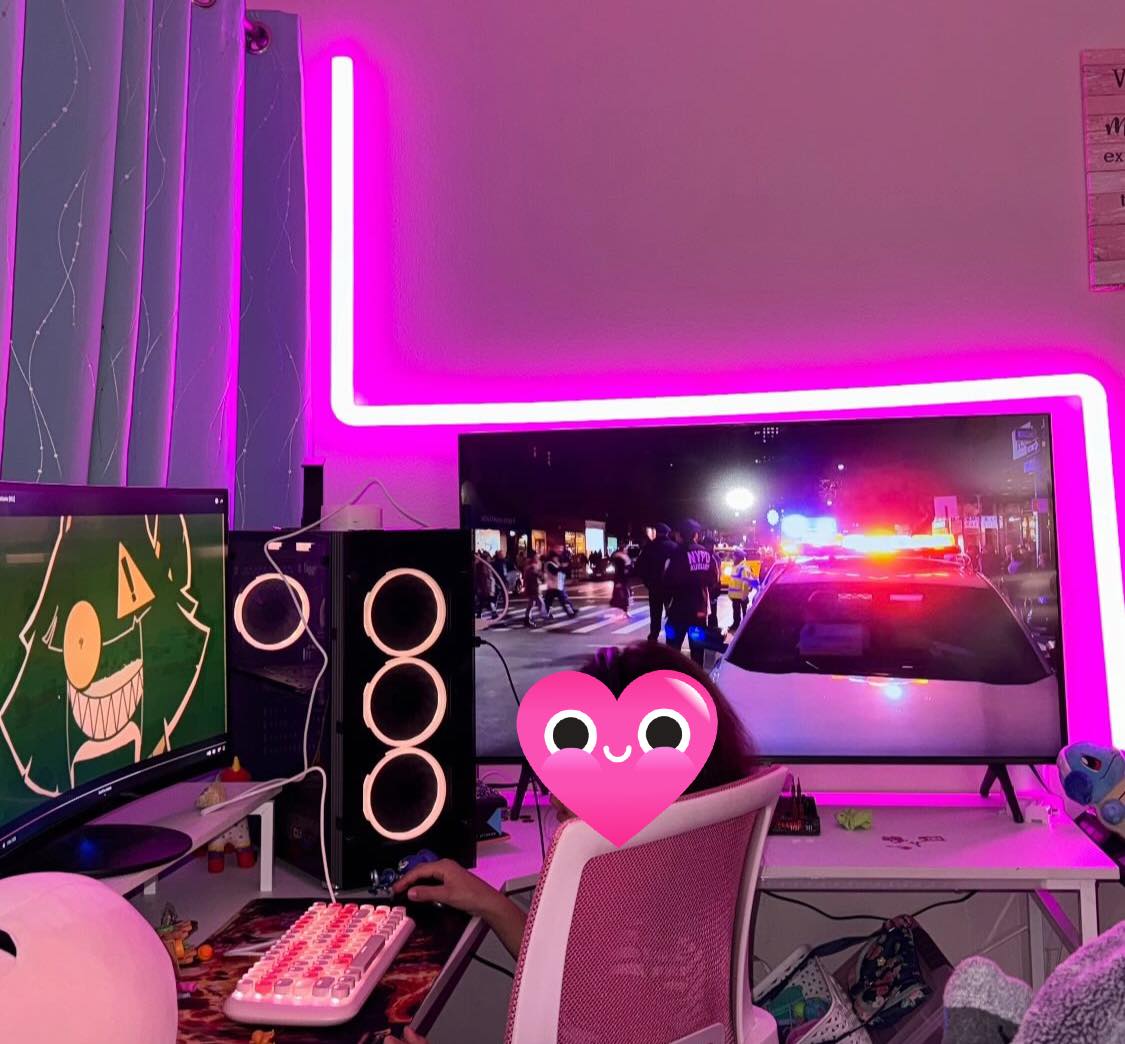 Dad and daughter gaming setup with GPUs