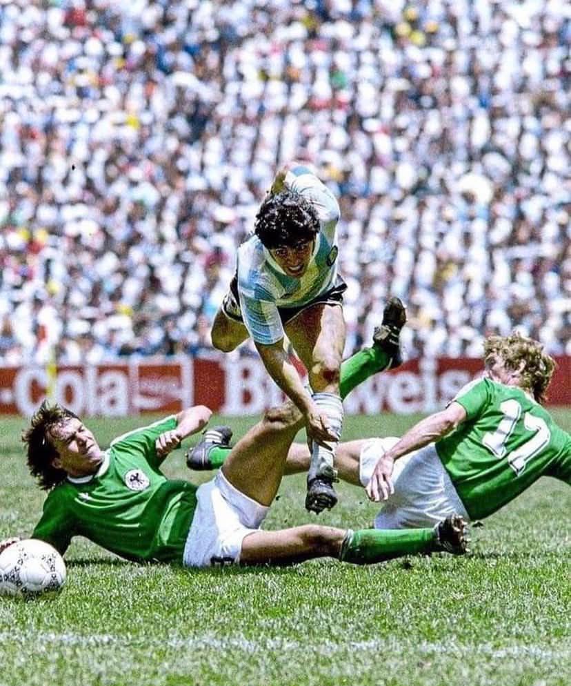 Diego Maradona in action against Matthäus and Jakobs Argentina