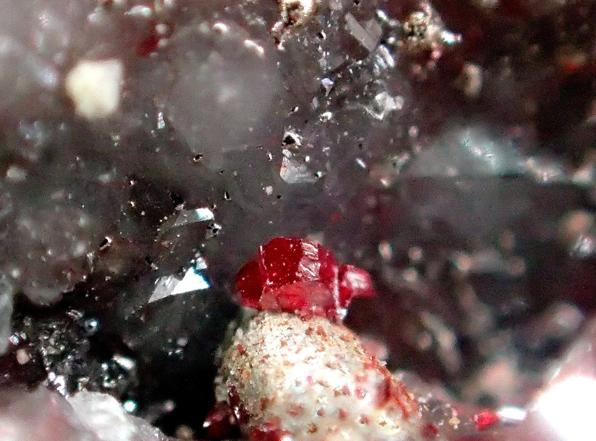 Native mercury and cinnabar on matrix from Almaden, Spain
