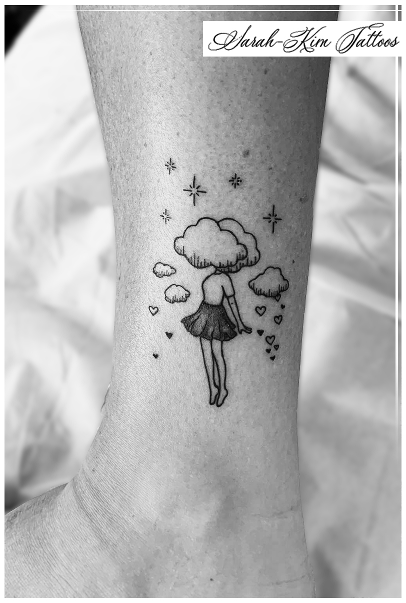 Tatouage Tete Dans Les Nuages