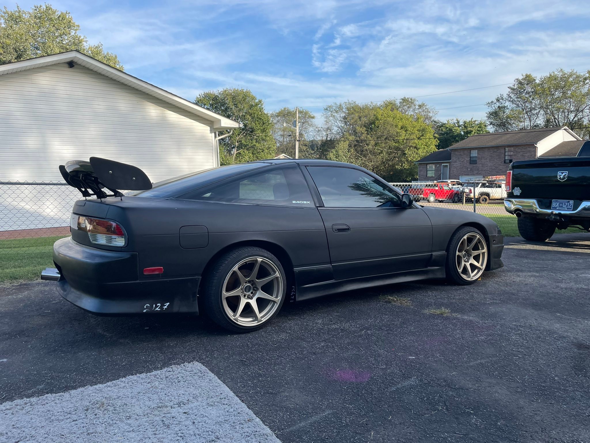 Uncles current project sitting next to my 240sx.
