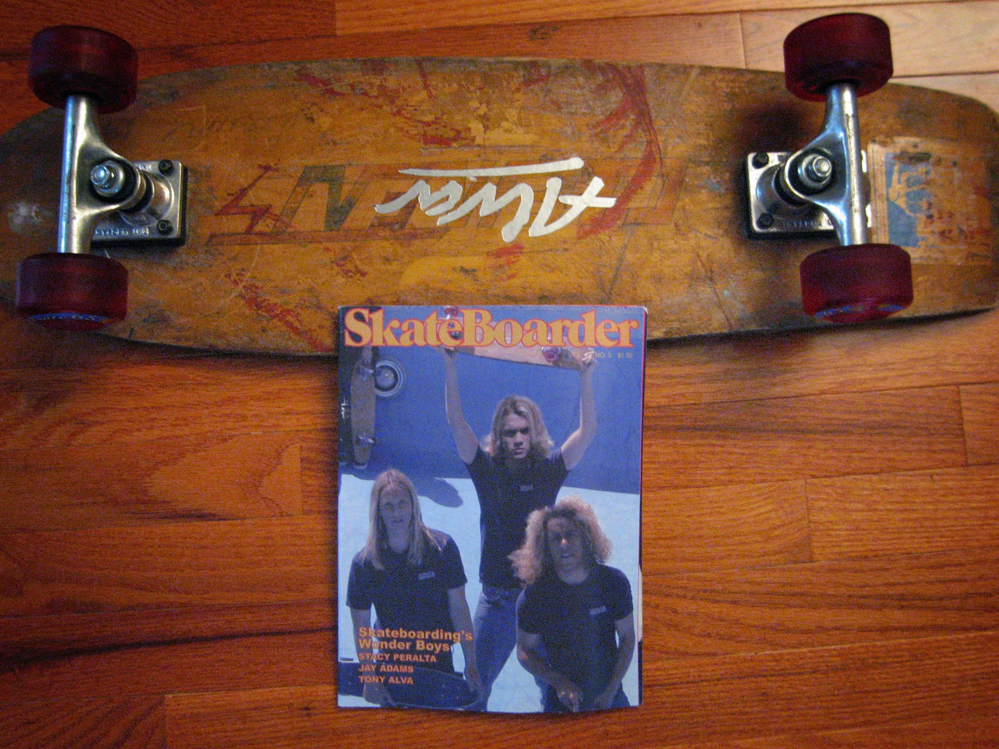 Lords of Dogtown movie prop skateboard and magazine