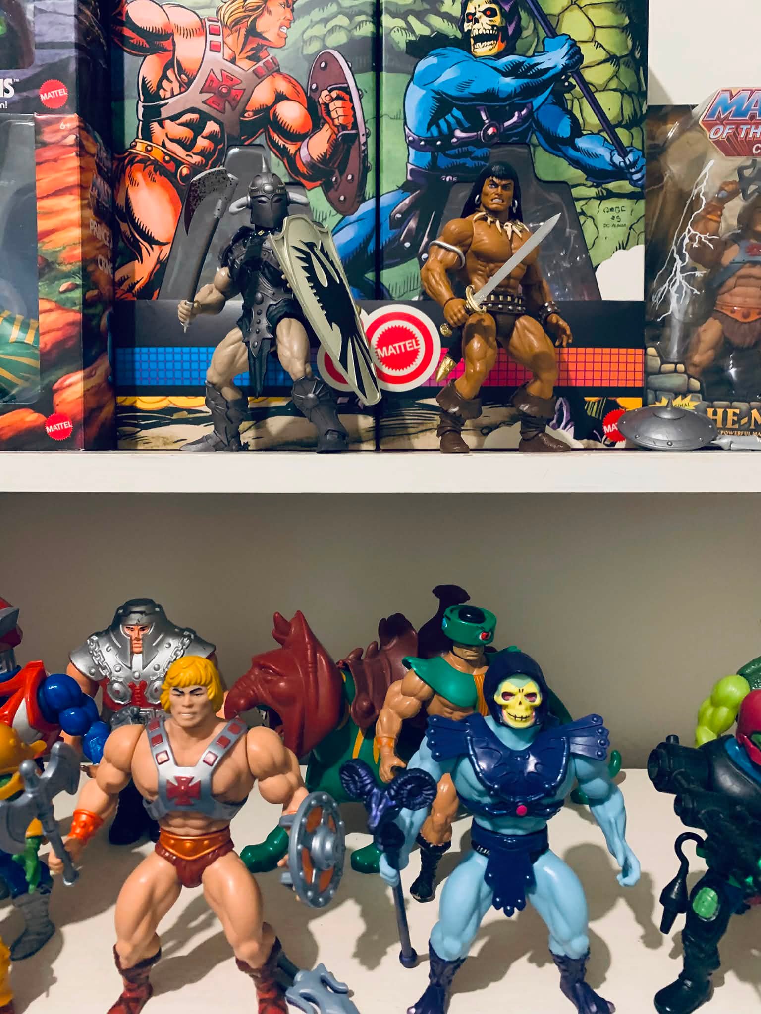 Frazetta Girls' 80s style Conan and Death Dealer figures stand out