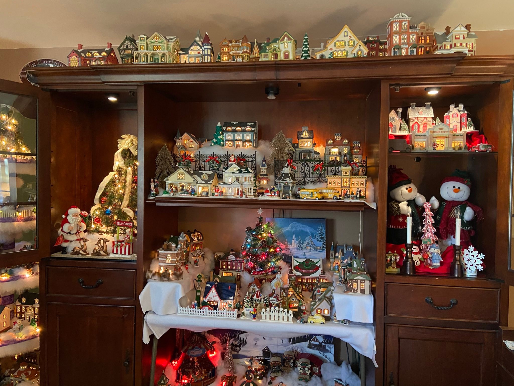 Large assortment of Collectable Dept. 56 Christmas Village Houses 