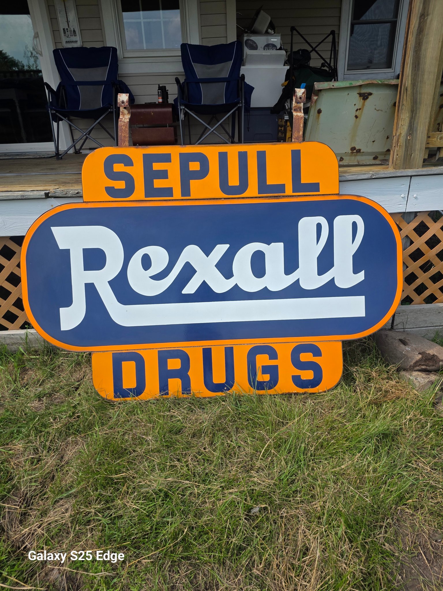 What does the original Sepull Rexall Drugs sign look like in
