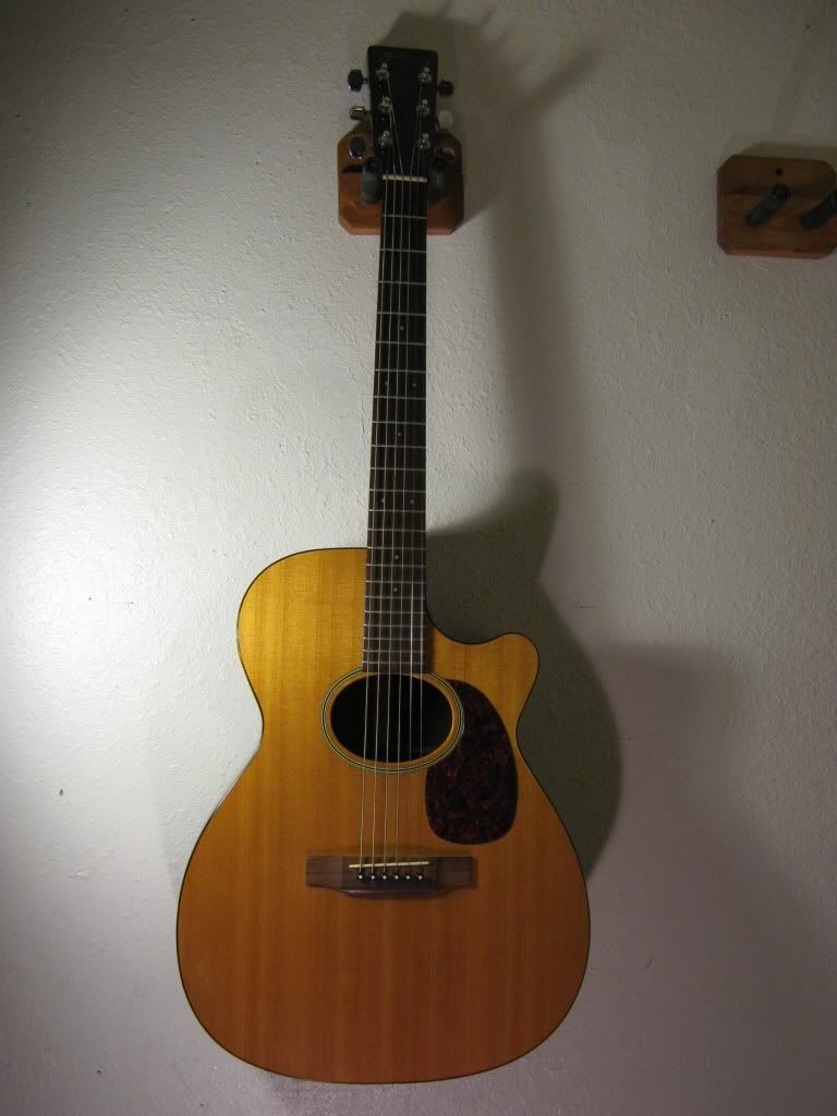What's the story behind my unique Martin 000-16 guitar?