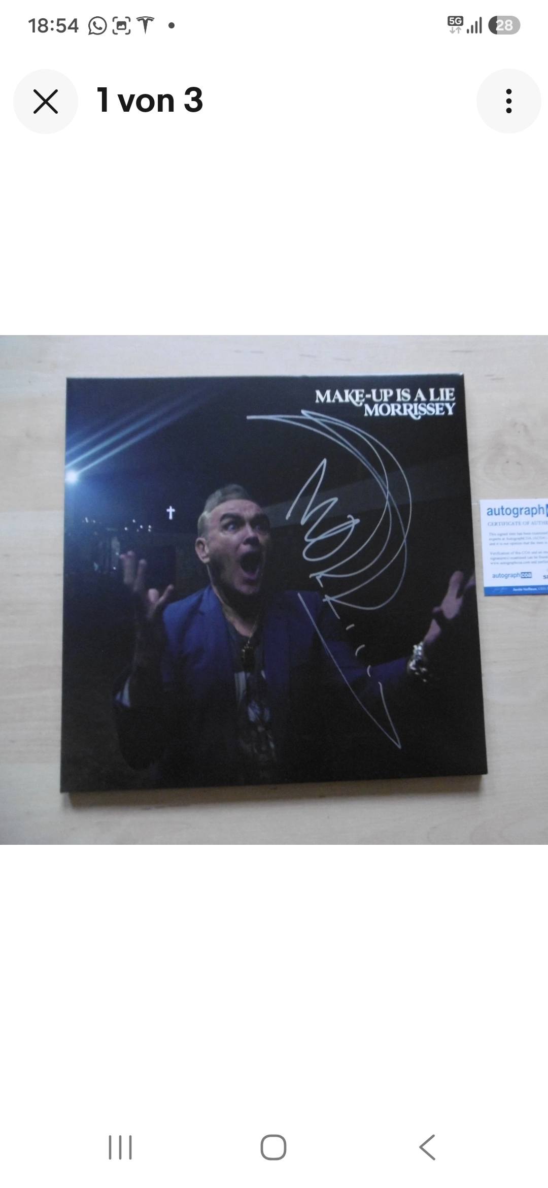 Morrissey signed LP cover and magazine page for sale