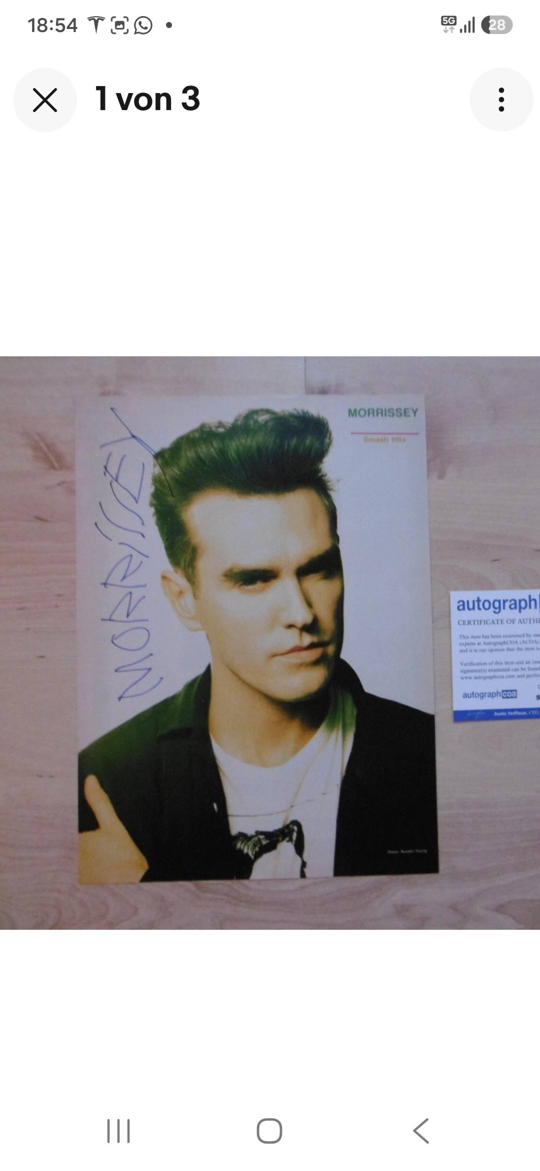 Morrissey signed LP cover and magazine page for sale