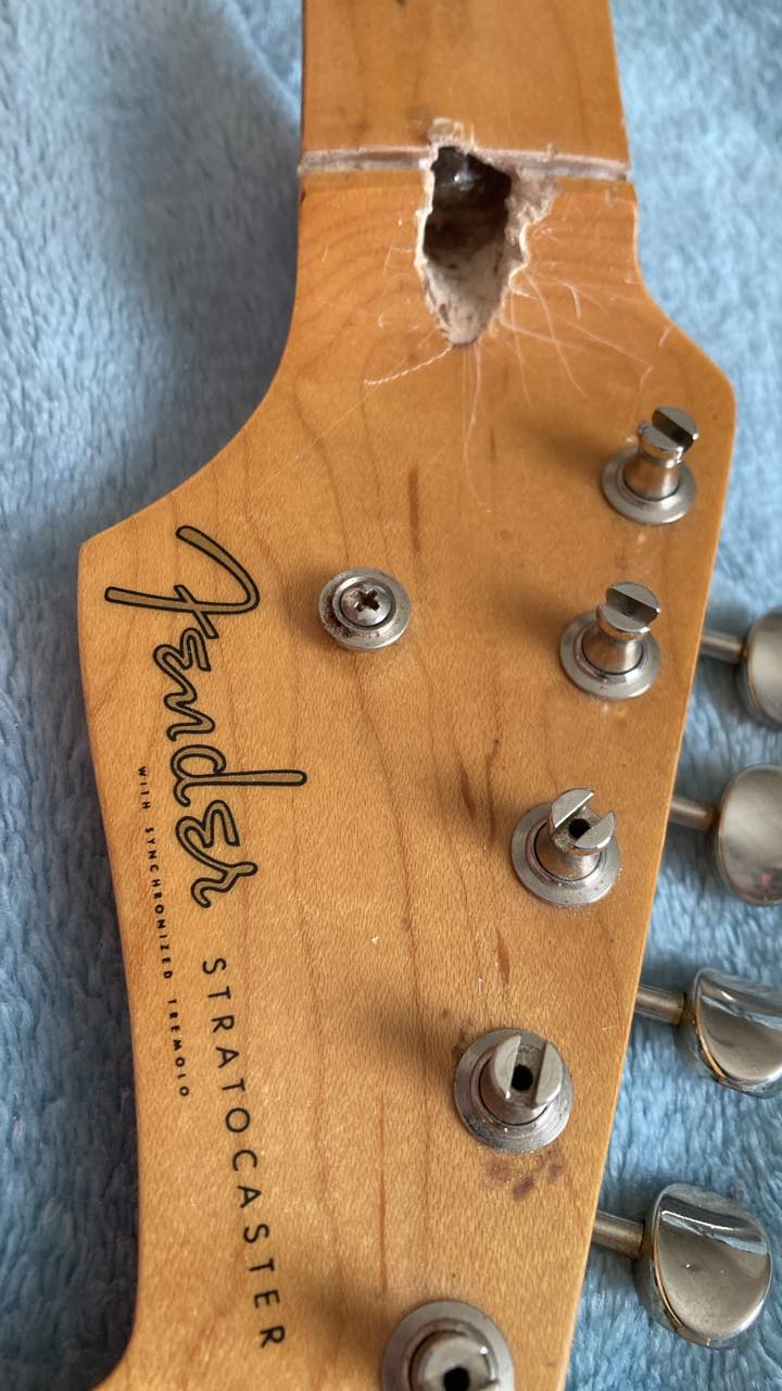 What is the neck radius of a Fender Japan ST-54 Stratocaster?
