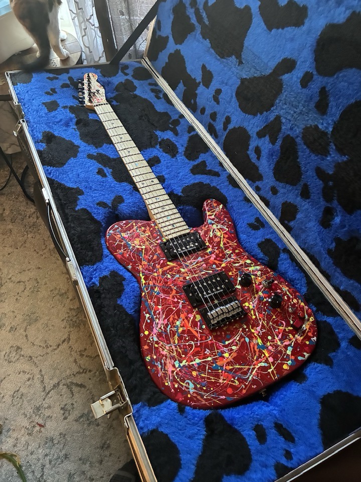 This is my Warmoth Gecko custom 5 string. Hawaiian Koa body, then