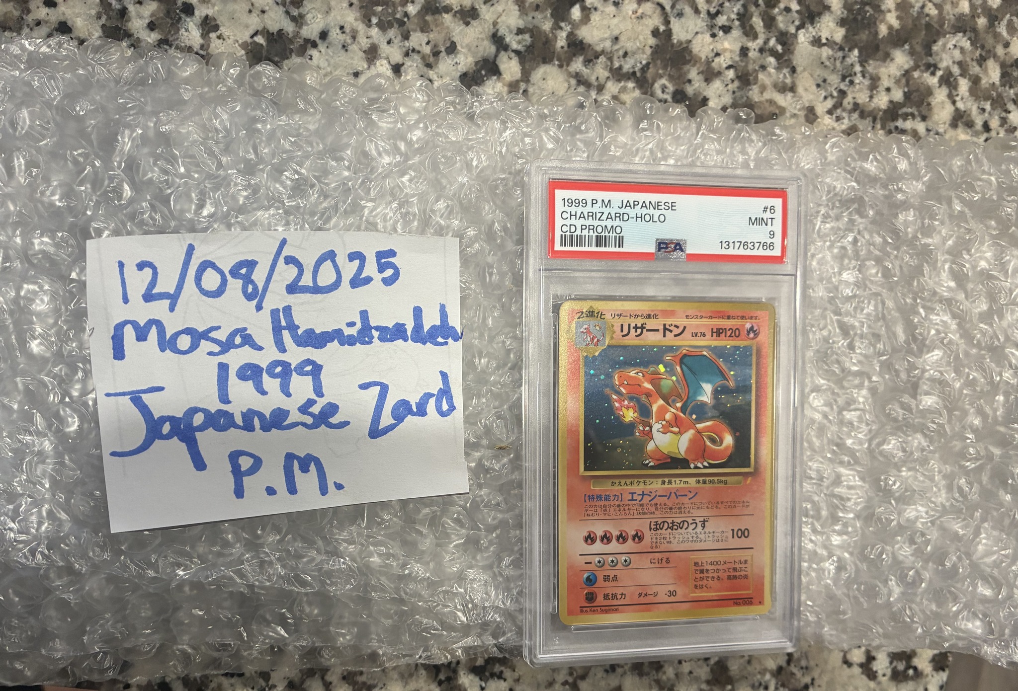 What would you offer on this 99 PSA 9 Japanese Charizard?