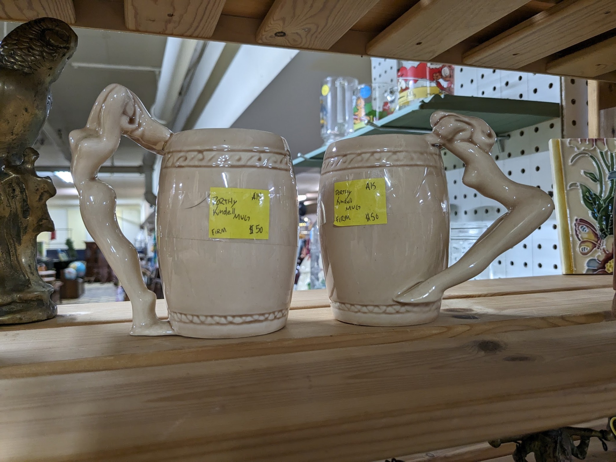 Dorothy Kindell mugs and steins at antique mall