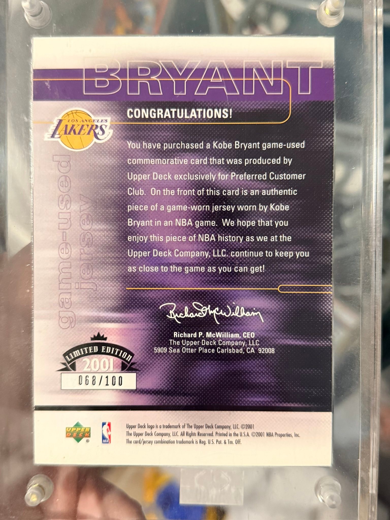 Kobe Bryant wore the patch inside this card over 20 years ago ?