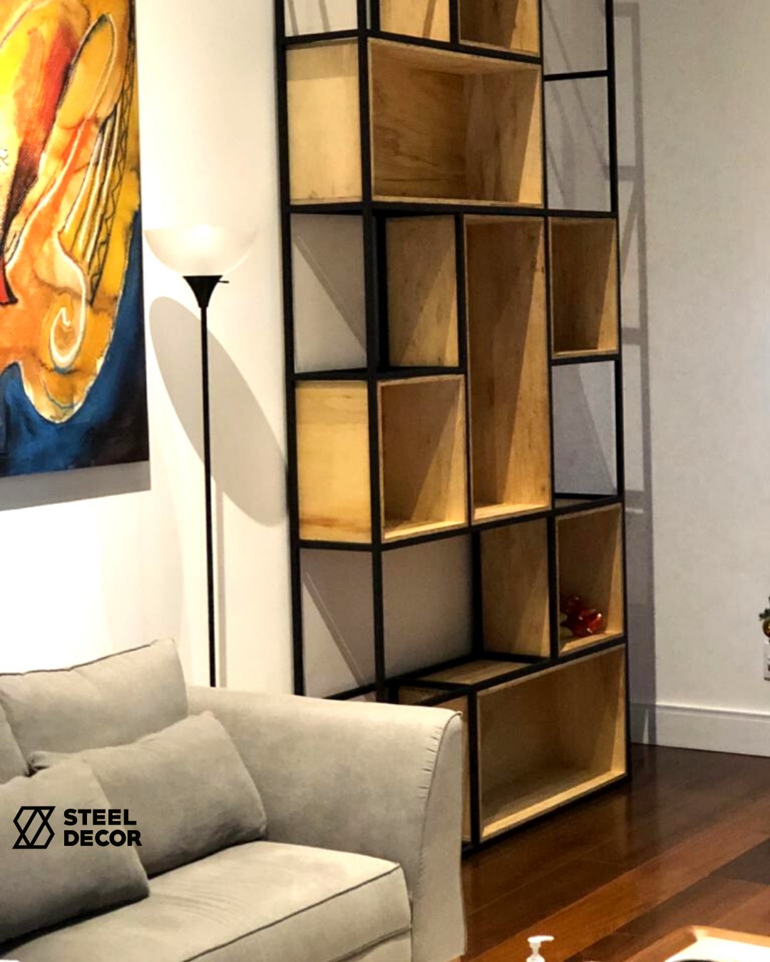 Essa estante de metalon com nichos em... - Steel Decor Móveis
