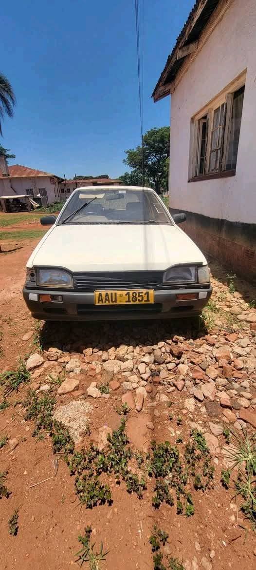 Quick Sale Mazda 323 Price:$599 Needs Carb Nyabira Deal Phone