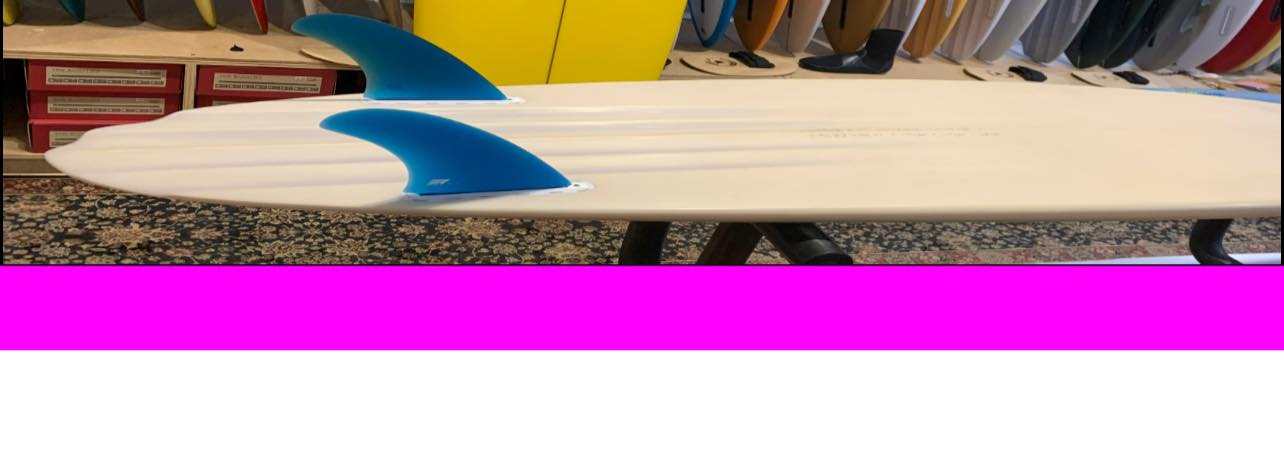 What's the ideal fin setup for a channel bottom twin surfboard?