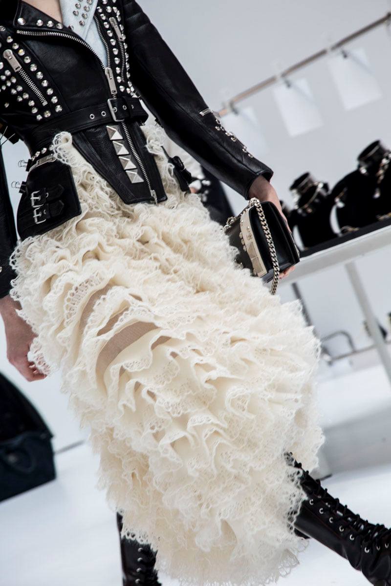 An exploded asymmetric skirt has ruffles in a fine silk rib ending