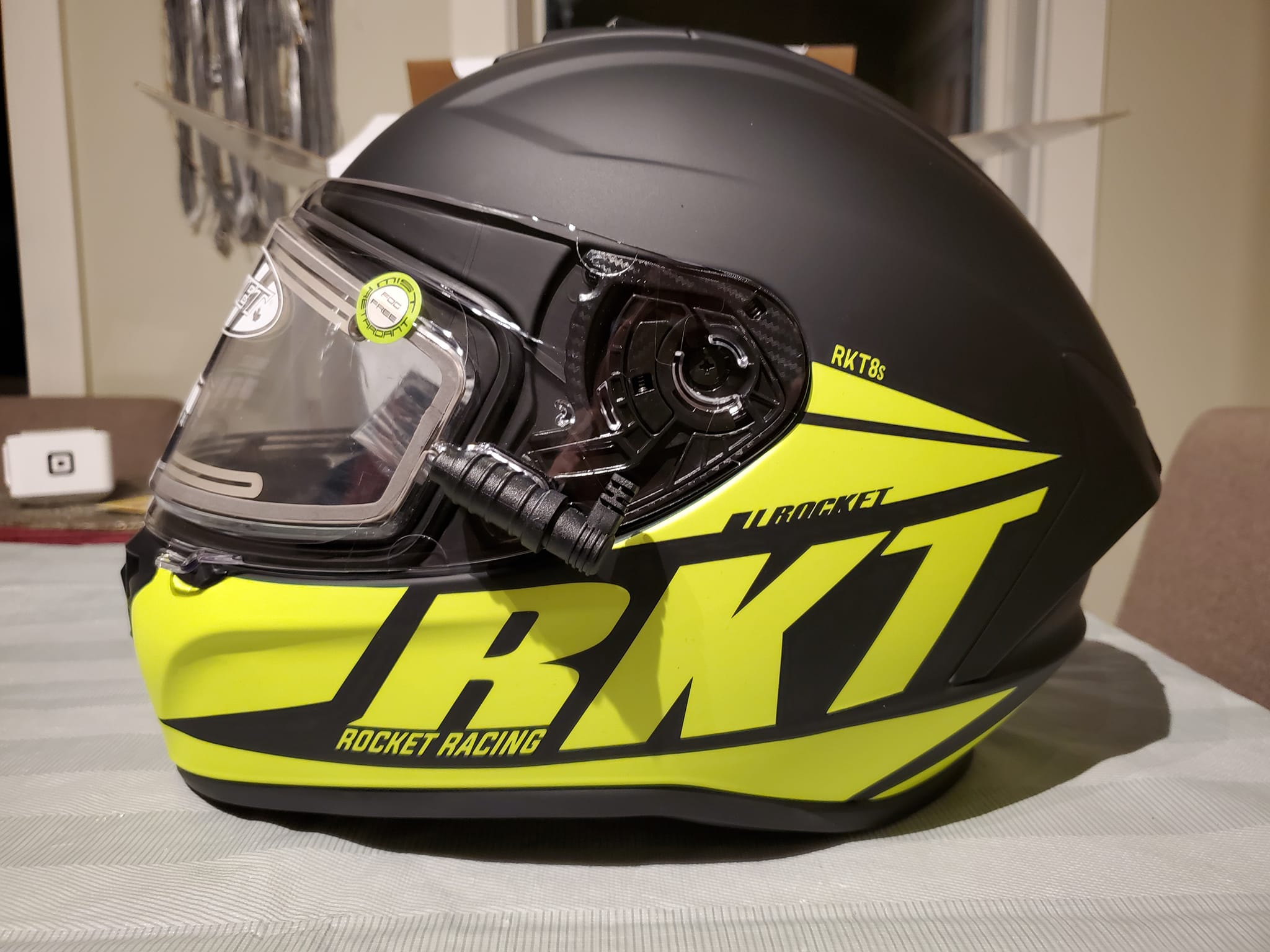 Black full-face Bell snowmobile helmet with a dual-pane clear