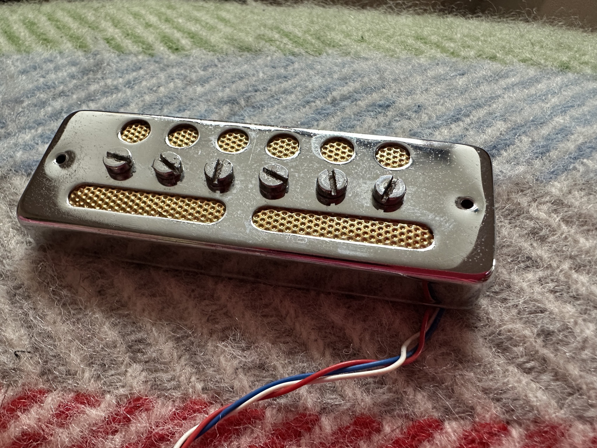 Is this 60s gold foil pickup authentic or a reproduction?