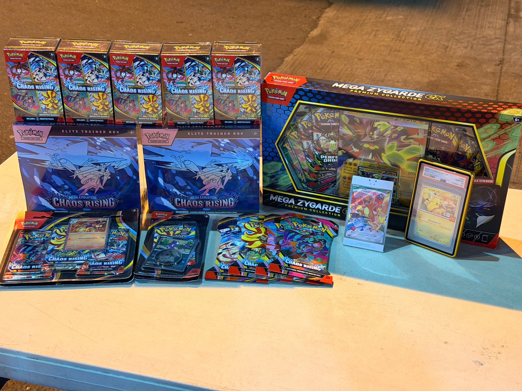 Chaos Rising ETB - (2) Chaos Rising BB - (5) Mega Zygarde EX - (1 