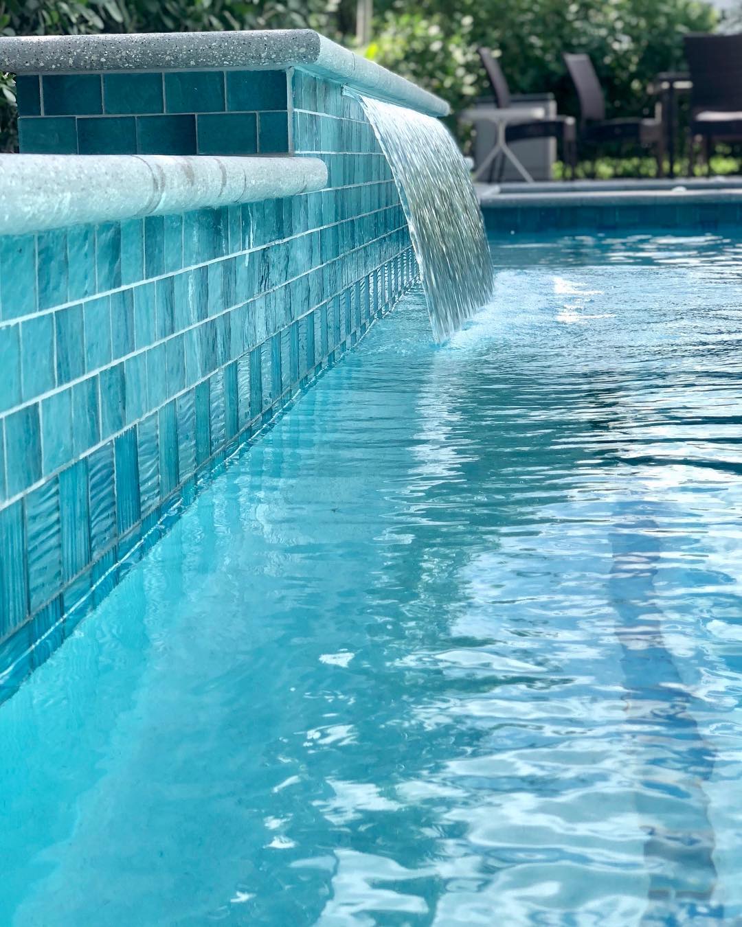 Essig Pools - A simple water feature with beautiful glass...