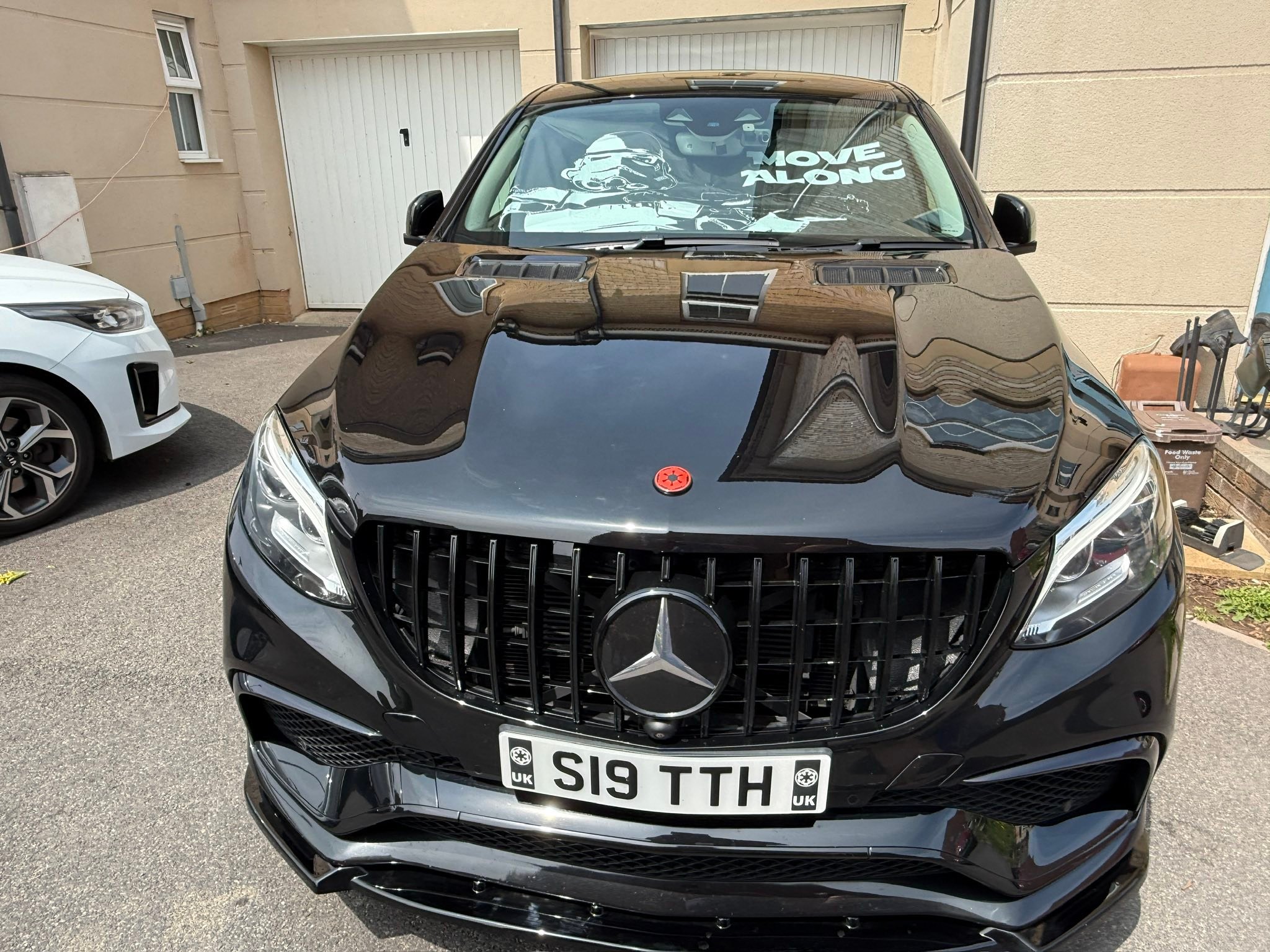 Where to find black AMG and GLE63S emblems with red accents for 