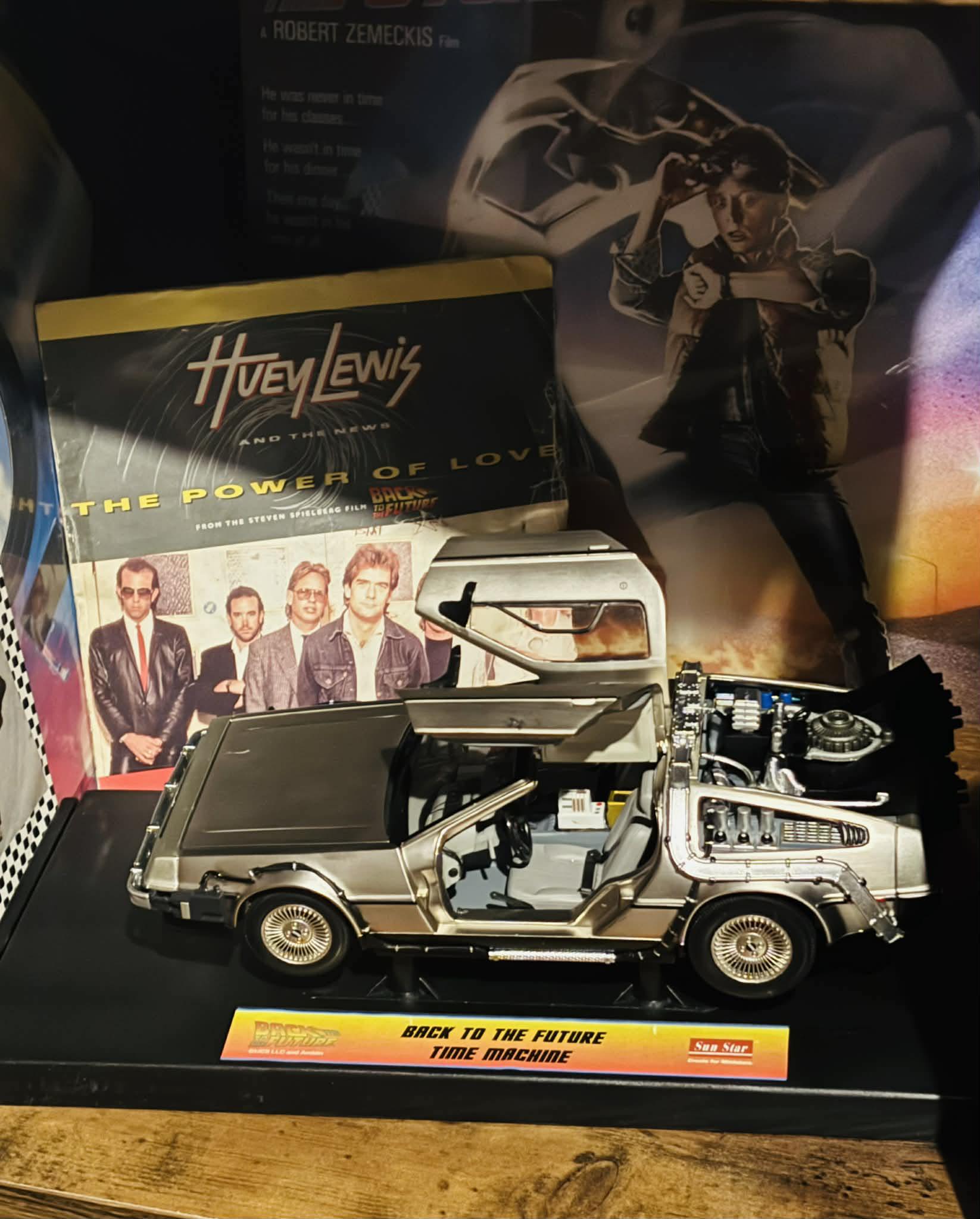 Enjoying Back to the Future trilogy with Delorean model