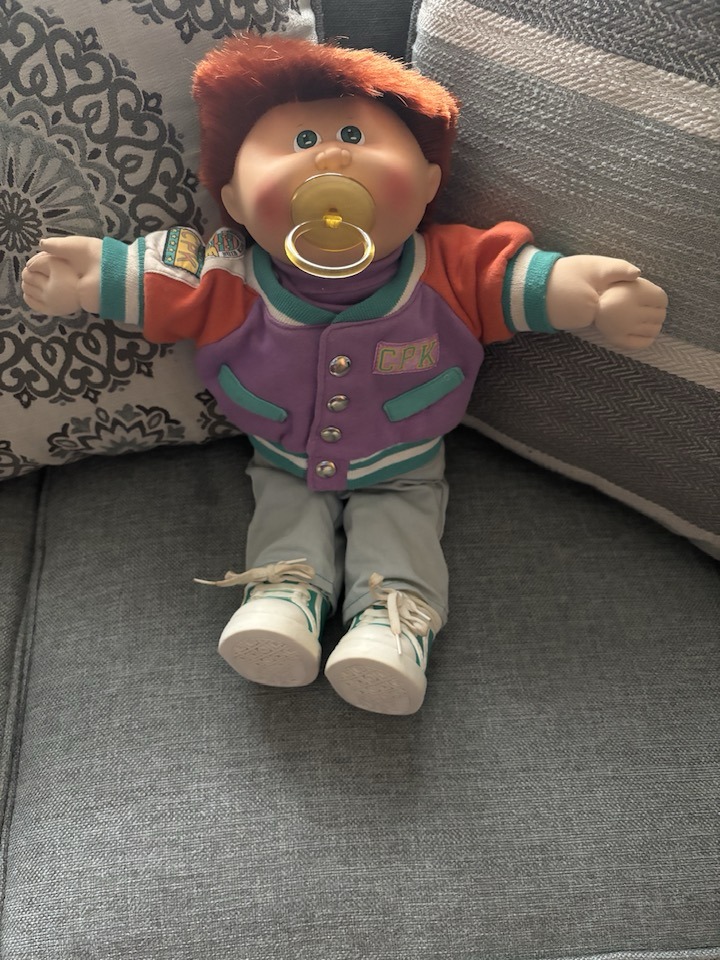 Hi everyone, I have this CPK red head boy doll with pacifier, head