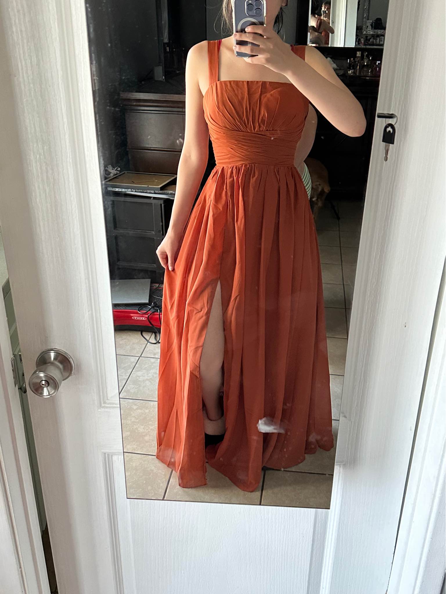 Terracotta / Burnt Orange Dress. Wore as a bridesmaids once no longer needed. Original price was $70 on Amazon. Has a cute leg slit and built in bra, the back is lace