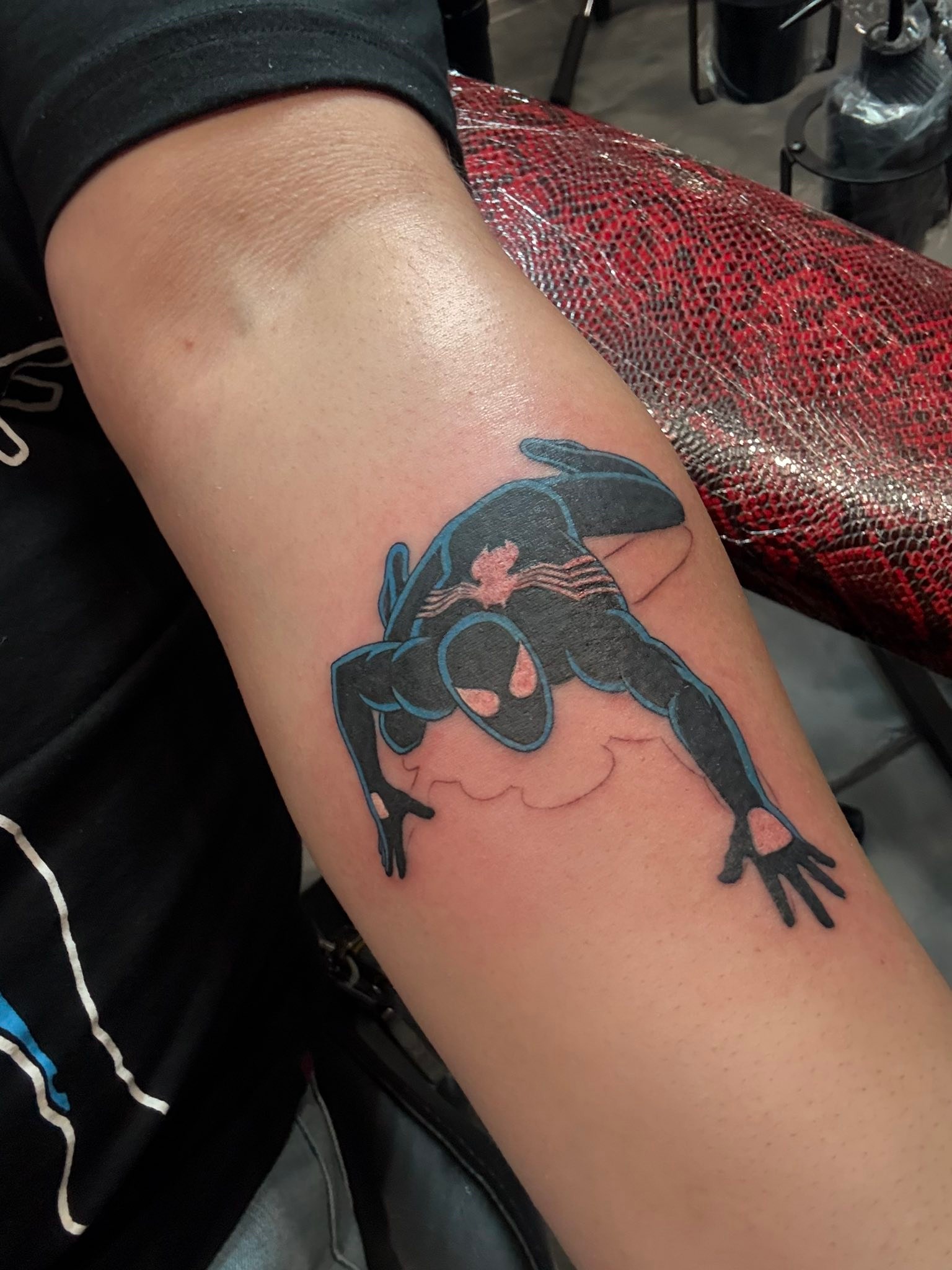 First tattoo! Based on auctioned off toy packaging art by John