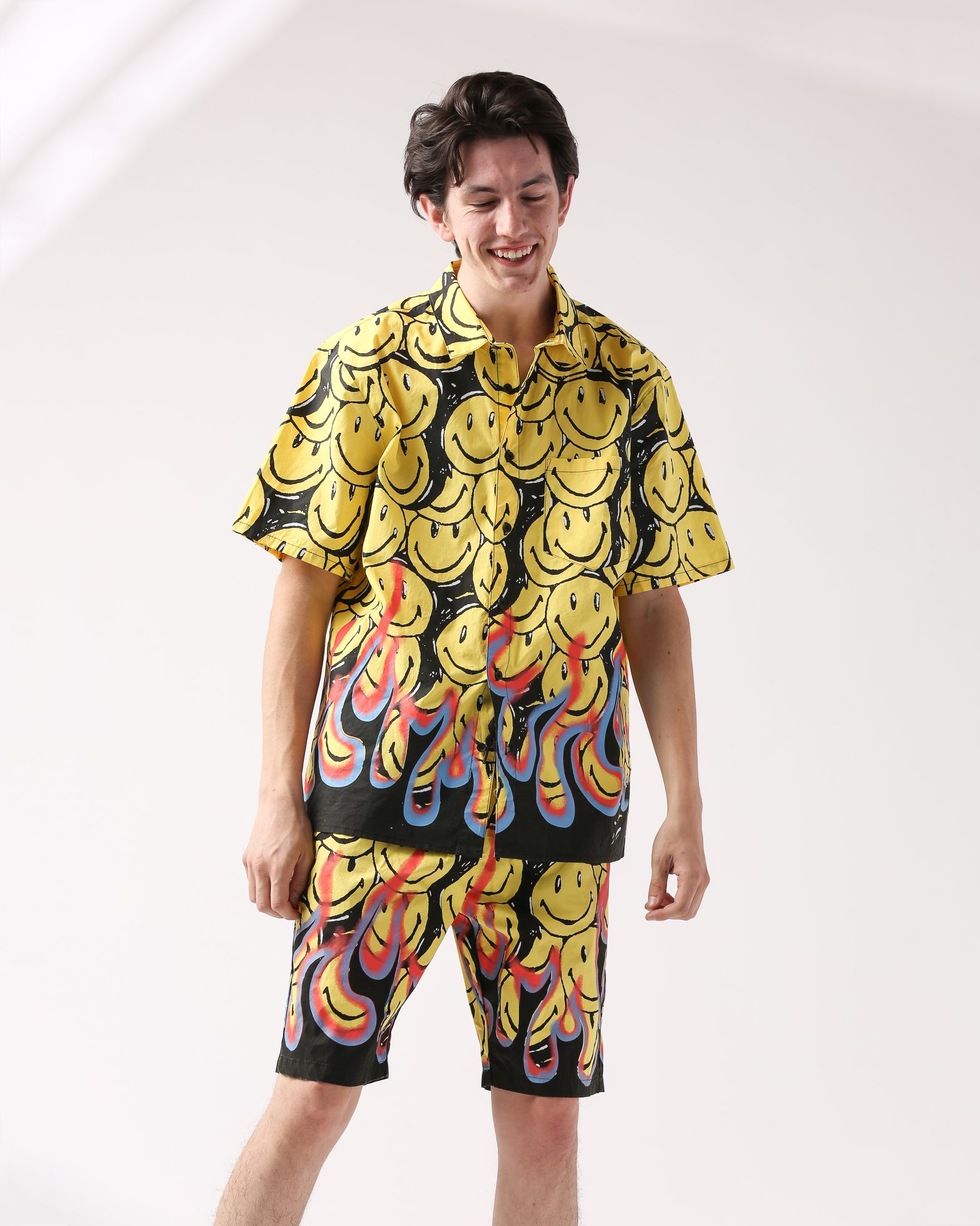 Shop Chinatown Market Smiley Flames SS Shirt Black/Yellow at itk 