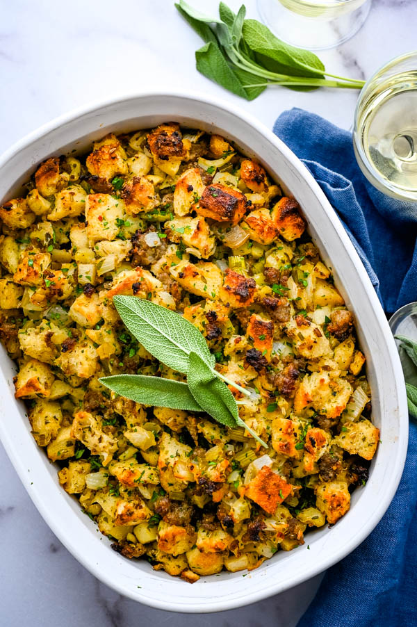 Skip the stress of stuffing the turkey with Ina Garten's Sausage, Apple & Herb Stuffing, which is cooked separately! 🍎🦃 #BarefootContessaBackToBasics