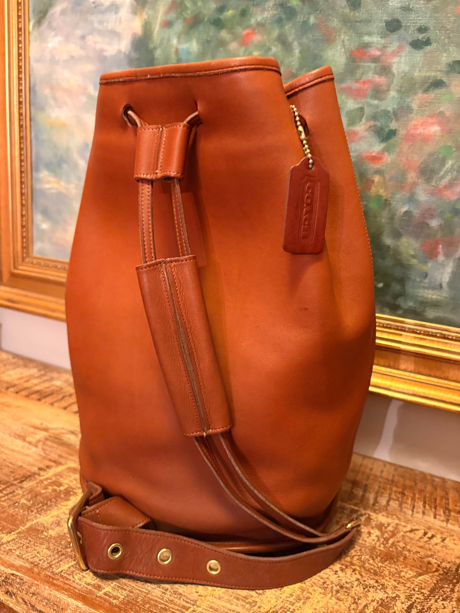 This is a vintage Coach Bixby Sling Bag, also known as 