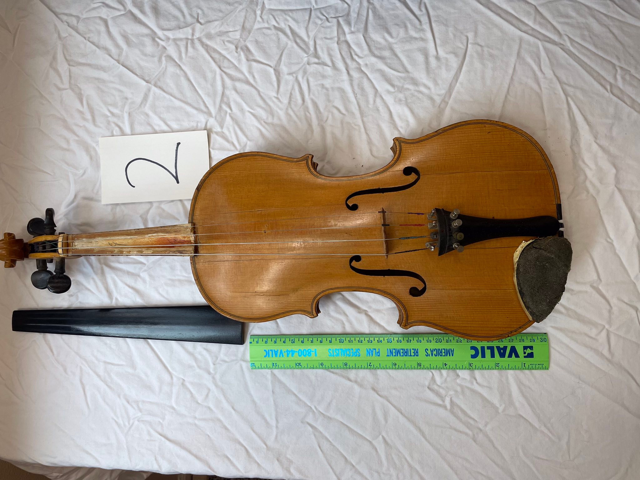 Identify old violins and their value?
