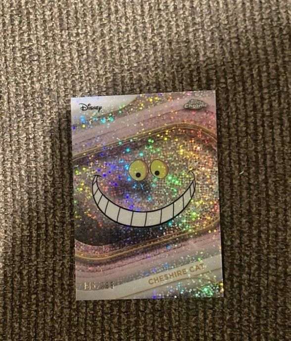Does foil Cheshire cat whisper card exist?
