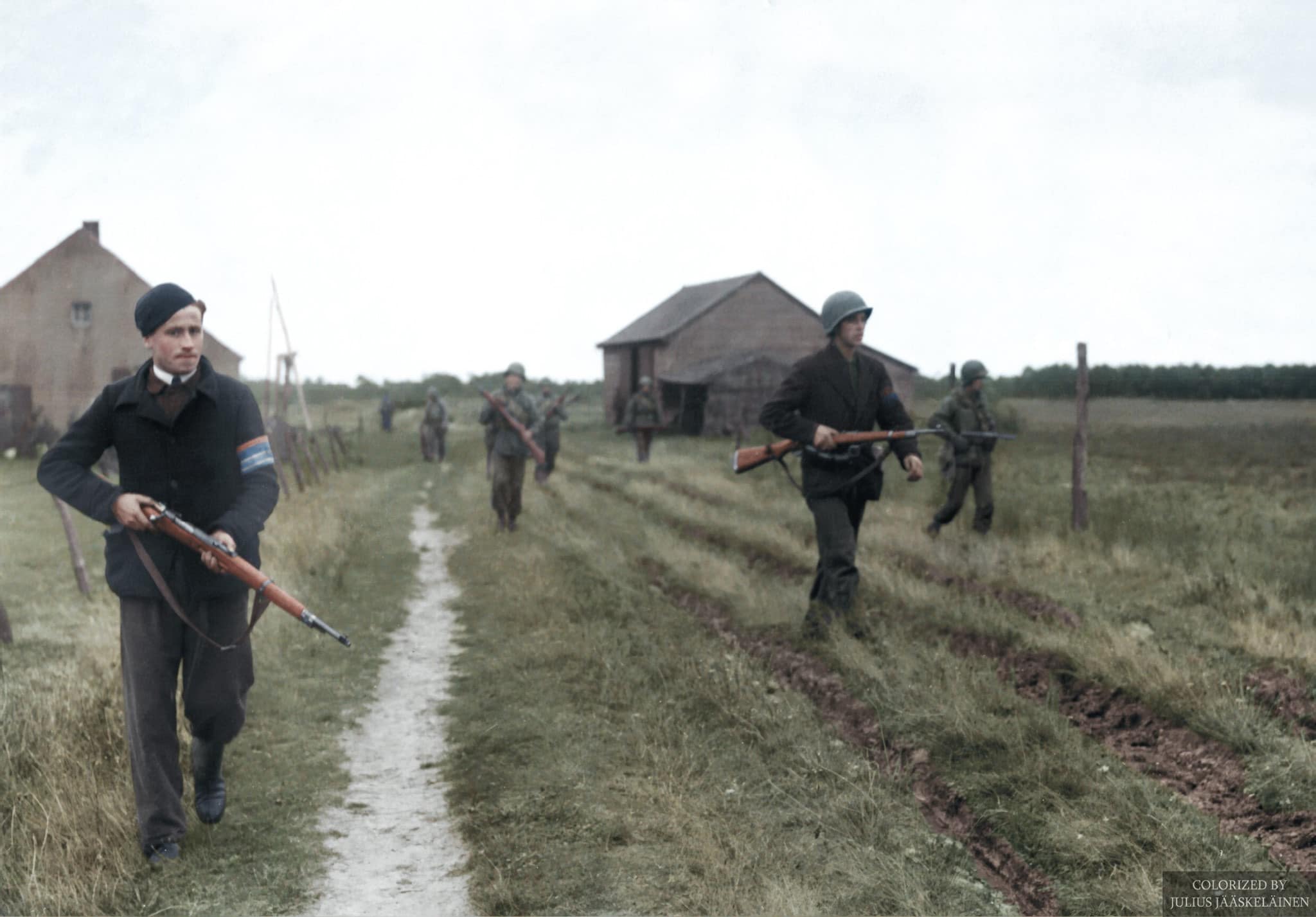 WW2 - Members of the Dutch resistance guide American soldiers of the ...